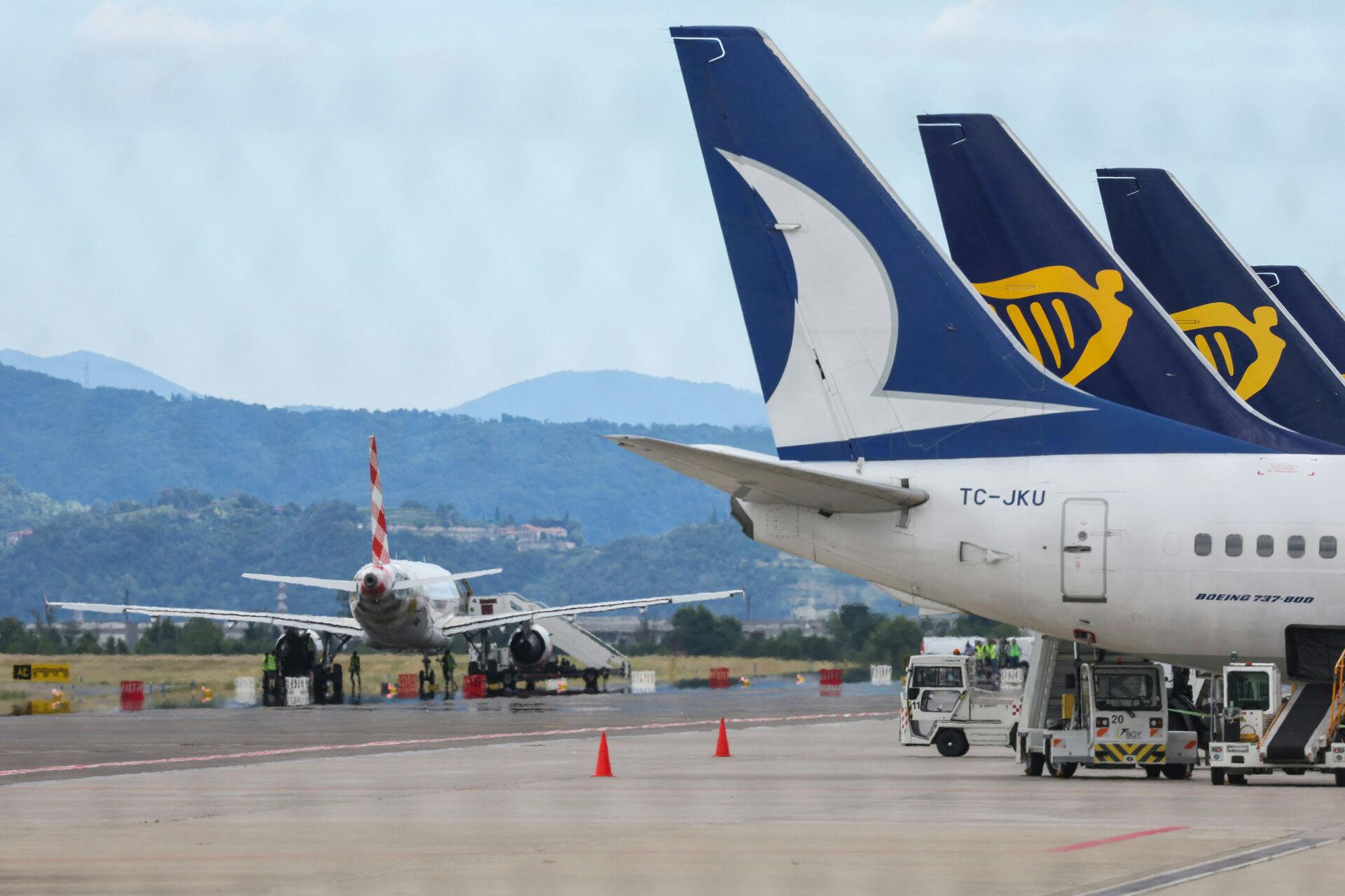 Aircrafts are seen at Milan Bergamo Airport, after flight operations were temporarily suspended when a person died on a runway during take-off preparations, in Orio al Serio, near Bergamo, Italy, July 8, 2025. REUTERS/Claudia Greco