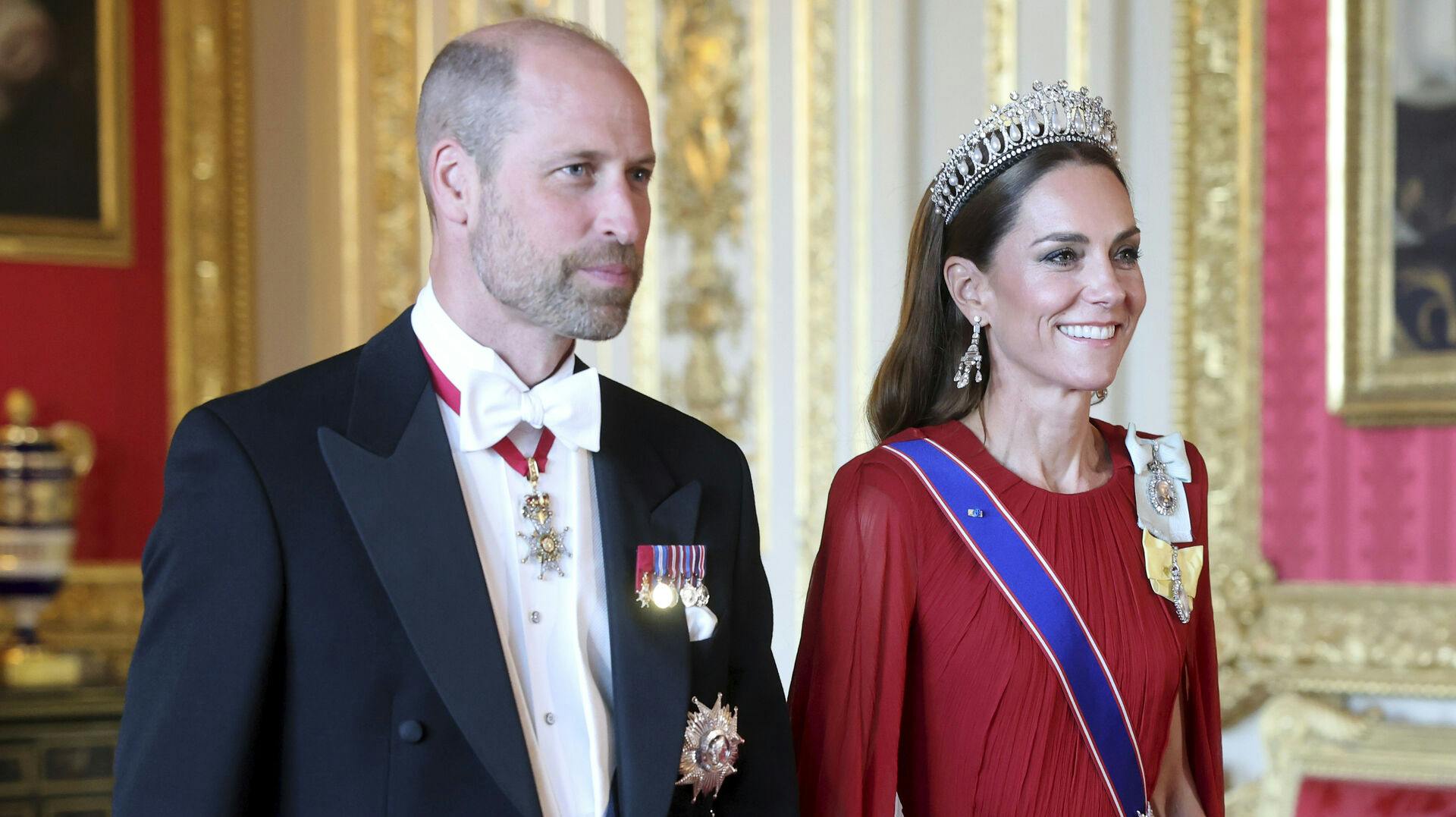 Britain's Prince William, and Kate, Princess of Wales attend the State Banquet at Windsor Castle in Windsor, England, Tuesday, July 8, 2025. (Chris Jackson/Pool Photo via AP)