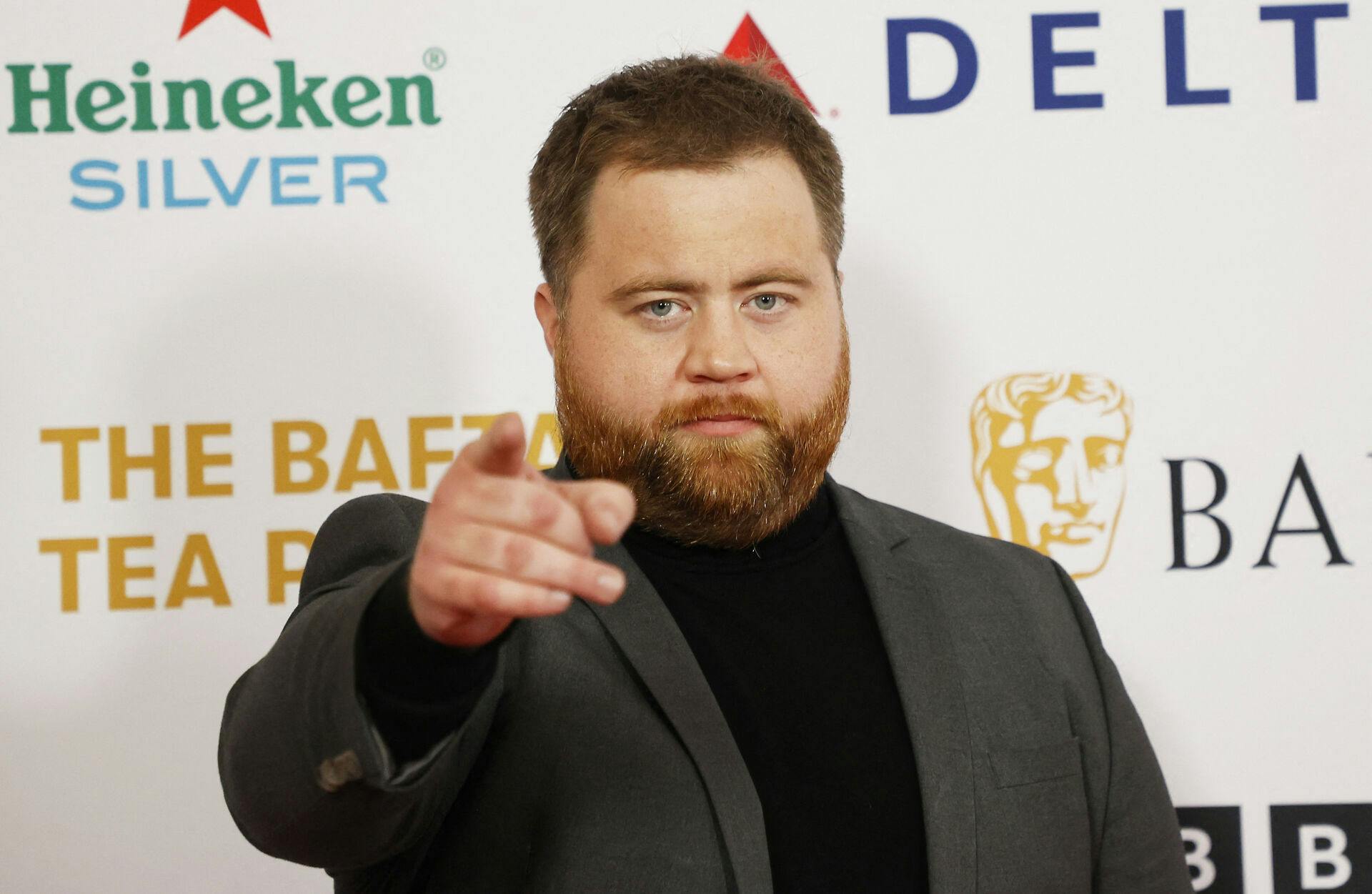 Paul Walter Hauser.