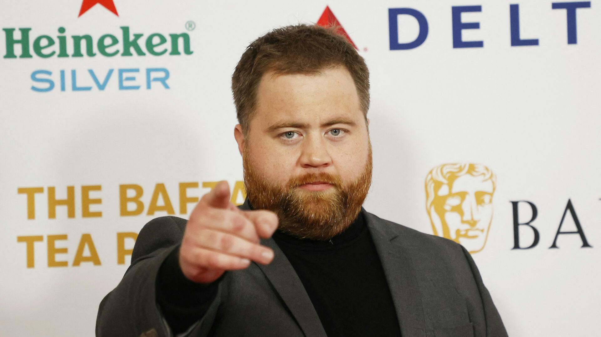 Paul Walter Hauser.