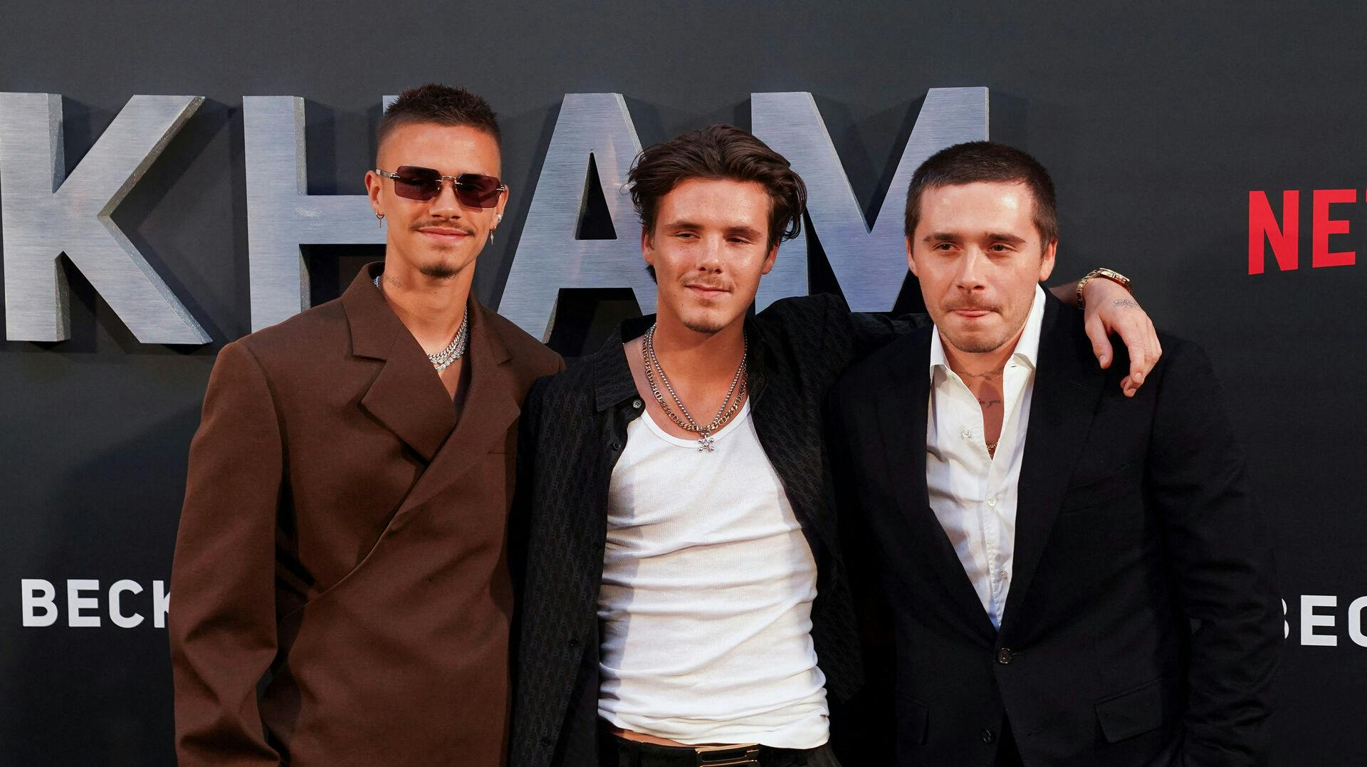 David Beckham's sons Brooklyn Peltz Beckham, Cruz Beckham and Romeo Beckham arrive to the premiere of a Netflix documentary called 'Beckham' in London, Britain October 3, 2023. REUTERS/Maja Smiejkowska