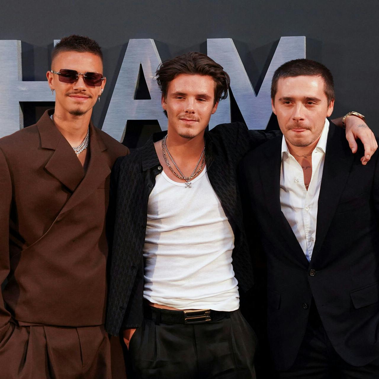 David Beckham's sons Brooklyn Peltz Beckham, Cruz Beckham and Romeo Beckham arrive to the premiere of a Netflix documentary called 'Beckham' in London, Britain October 3, 2023. REUTERS/Maja Smiejkowska
