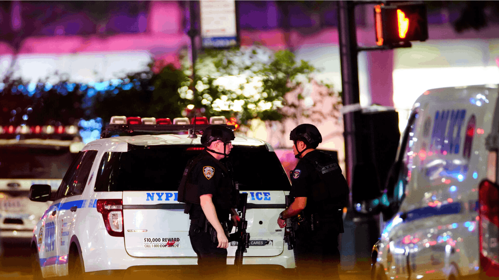 Police officers work near the scene of a reported shooter situation in the Manhattan borough of New York City, U.S. July 28, 2025. REUTERS/Eduardo Munoz