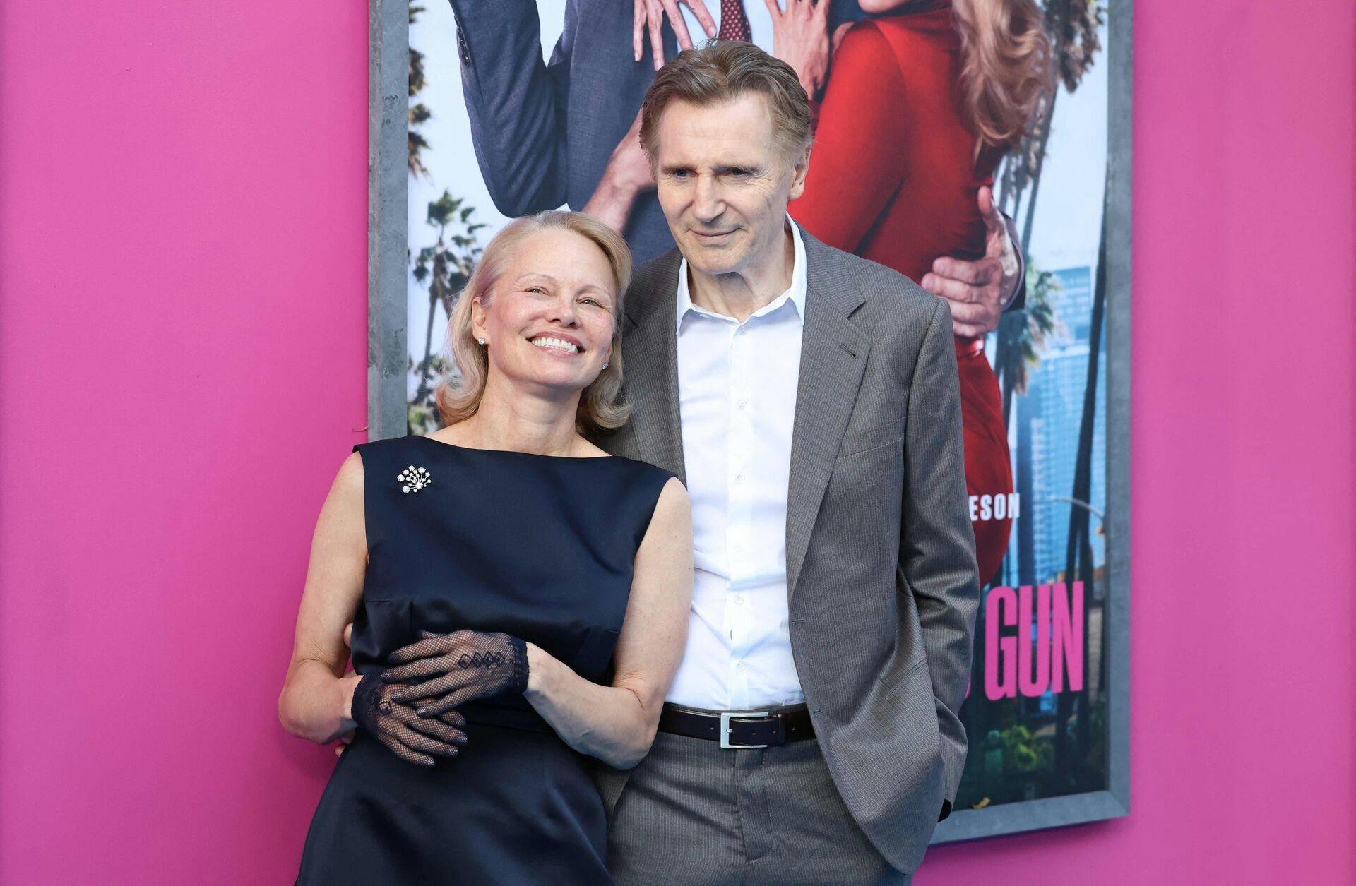 TOPSHOT - Canadian-US actress Pamela Anderson and British actor Liam Neeson attend the US premiere of Paramount Pictures's "The Naked Gun" in New York City on July 28, 2025. (Photo by CHARLY TRIBALLEAU / AFP)