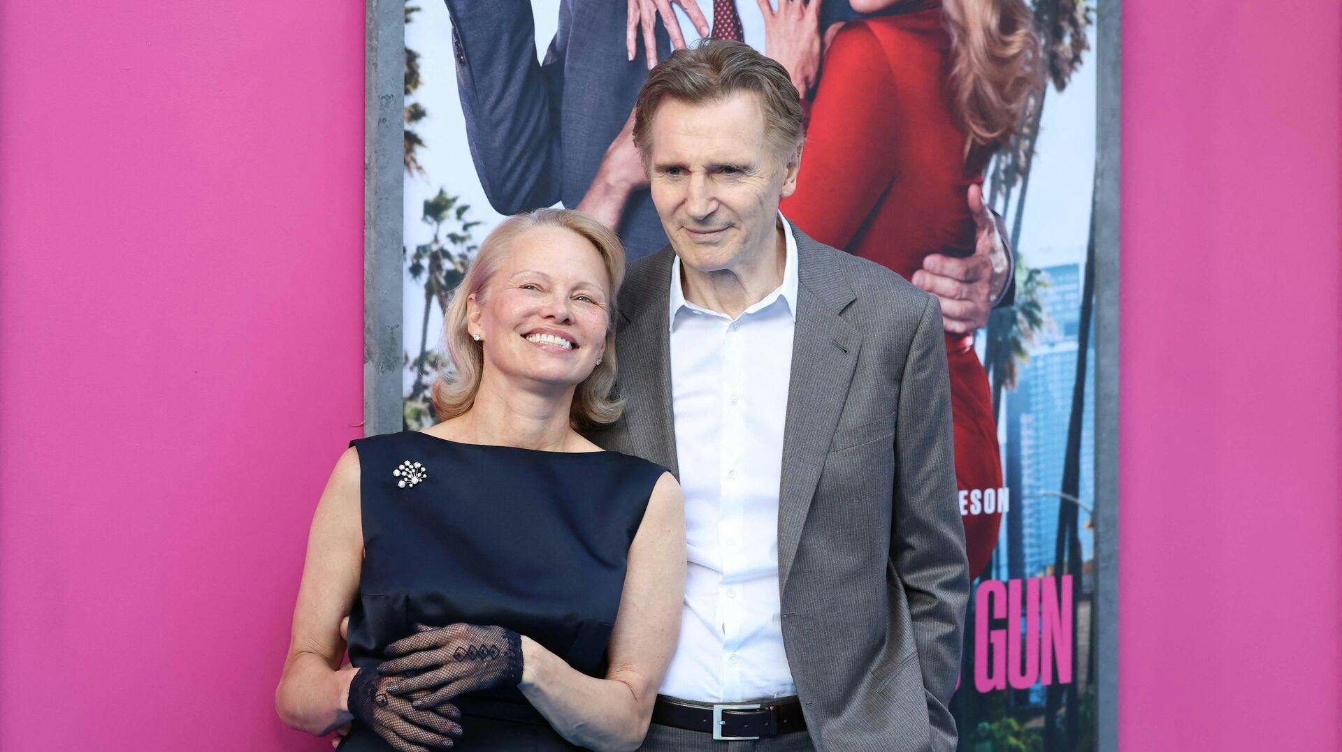 TOPSHOT - Canadian-US actress Pamela Anderson and British actor Liam Neeson attend the US premiere of Paramount Pictures's "The Naked Gun" in New York City on July 28, 2025. (Photo by CHARLY TRIBALLEAU / AFP)