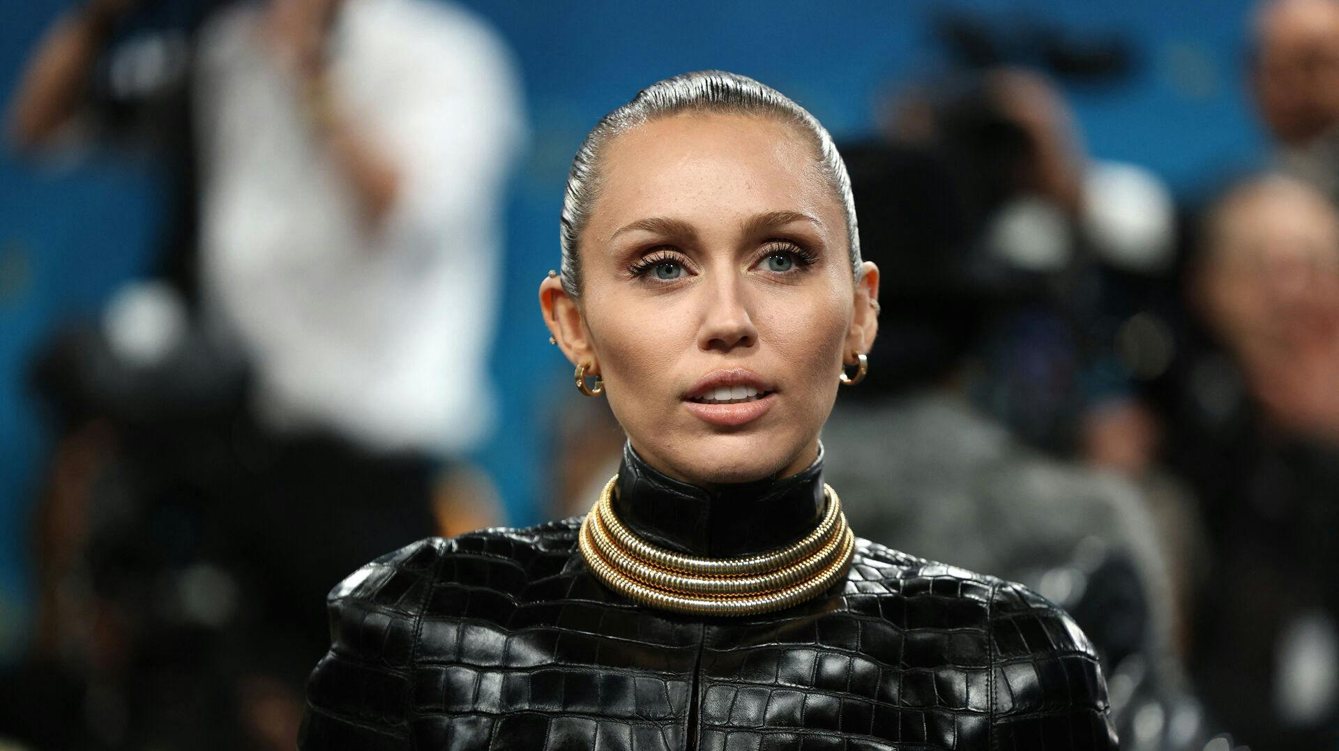Miley Cyrus poses during the Met Gala, an annual f