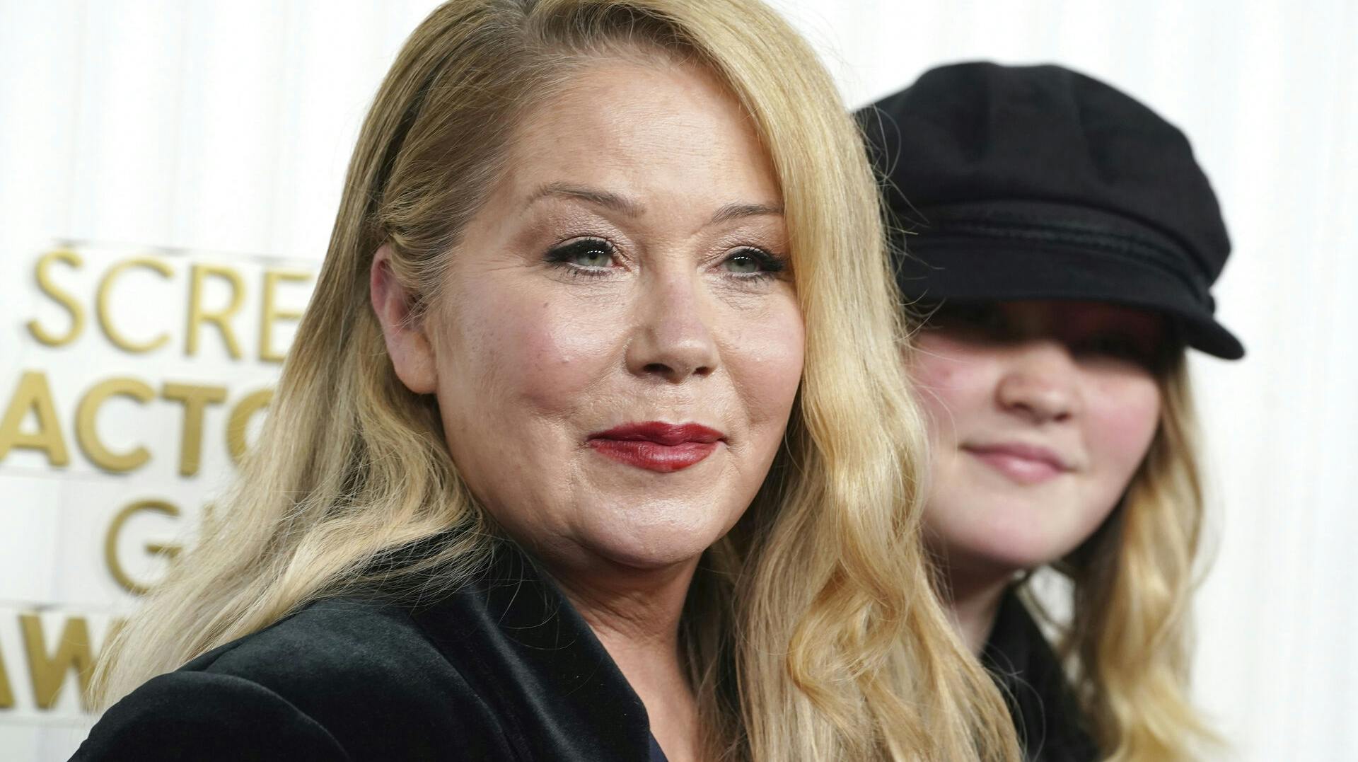Christina Applegate, left, and Sadie Grace LeNoble arrive at the 29th annual Screen Actors Guild Awards on Sunday, Feb. 26, 2023, at the Fairmont Century Plaza in Los Angeles. (Photo by Jordan Strauss/Invision/AP)