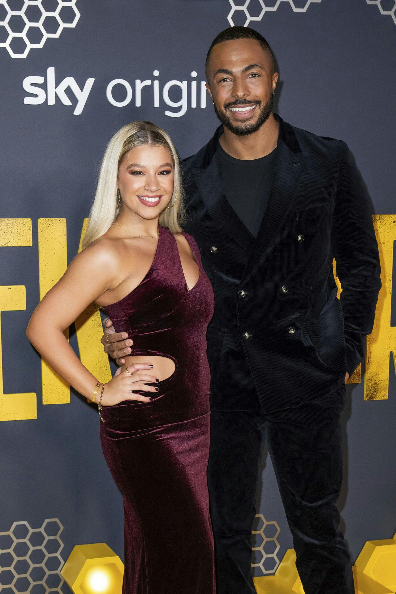 Molly Rainford, left, and Tyler West pose for photographers upon arrival at the UK premiere of the film 'The Beekeeper' on Wednesday, Jan. 10, 2024 in London. (Scott A Garfitt/Invision/AP)