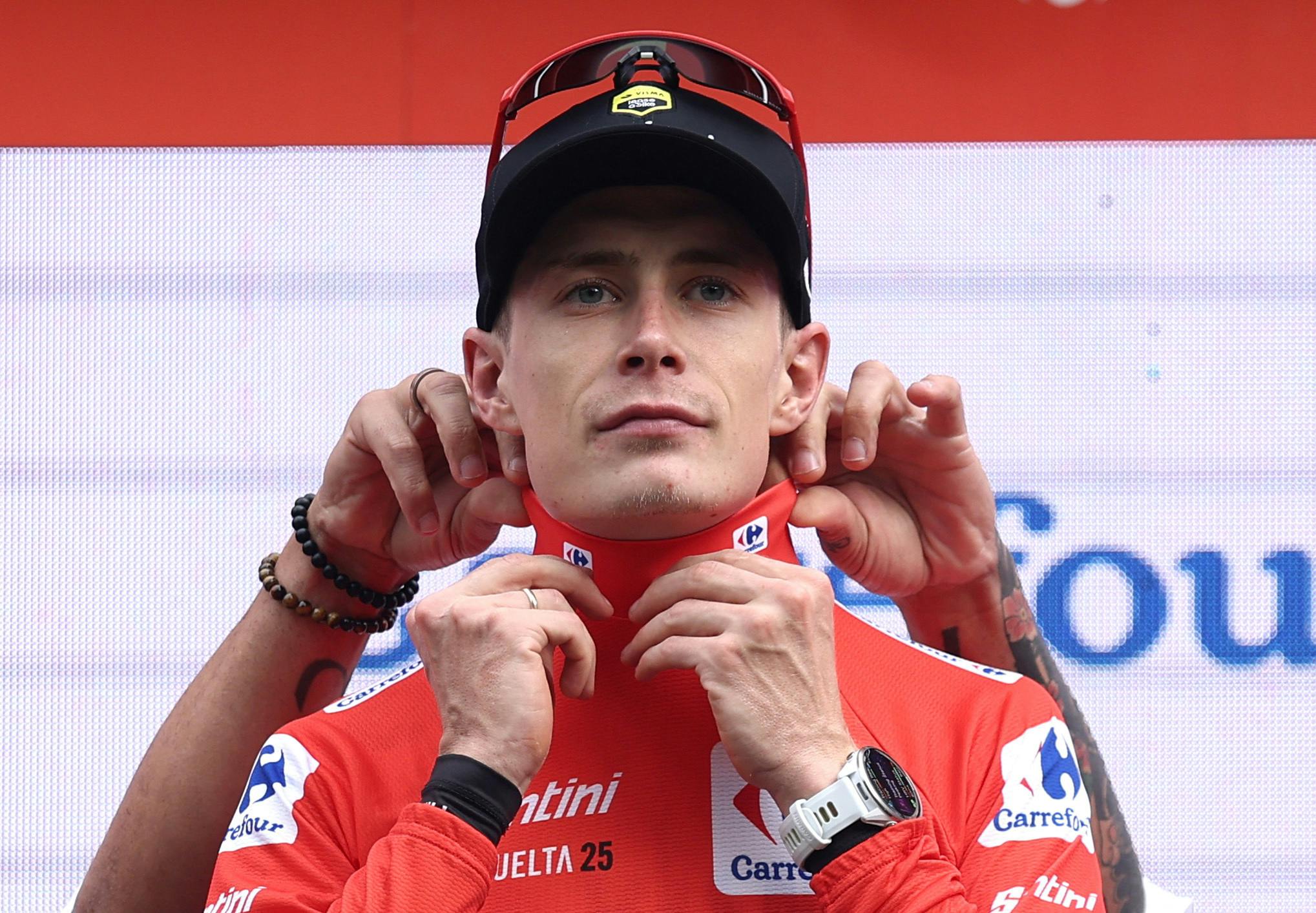 Cycling - Vuelta a Espana - Stage 3 - San Maurizio Canavese to Ceres - San Maurizio Canavese, Italy - August 25, 2025 Team Visma Lease A Bike's Jonas Vingegaard on the podium wearing the red jersey after stage 3 REUTERS/Manon Cruz