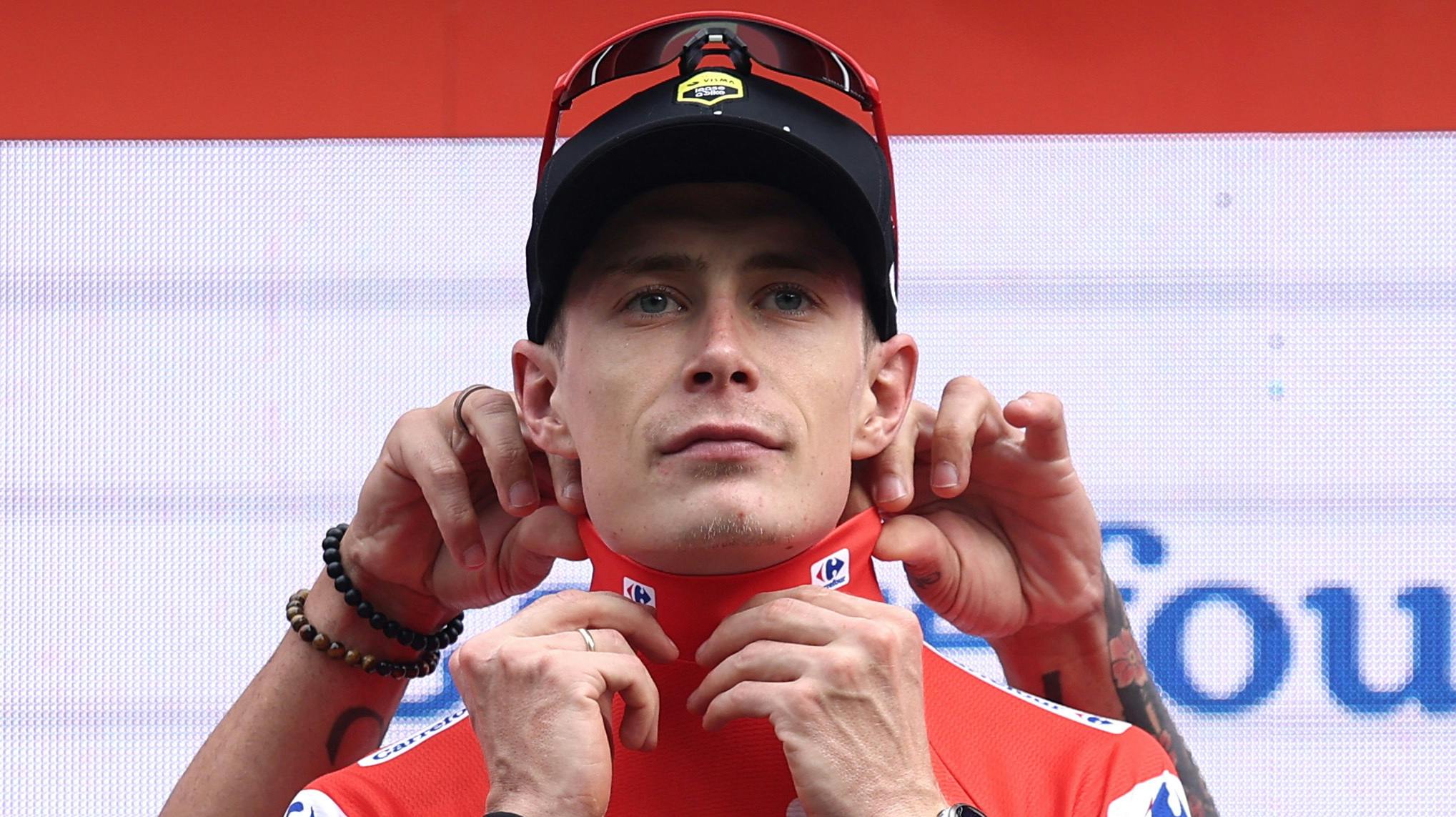 Cycling - Vuelta a Espana - Stage 3 - San Maurizio Canavese to Ceres - San Maurizio Canavese, Italy - August 25, 2025 Team Visma Lease A Bike's Jonas Vingegaard on the podium wearing the red jersey after stage 3 REUTERS/Manon Cruz