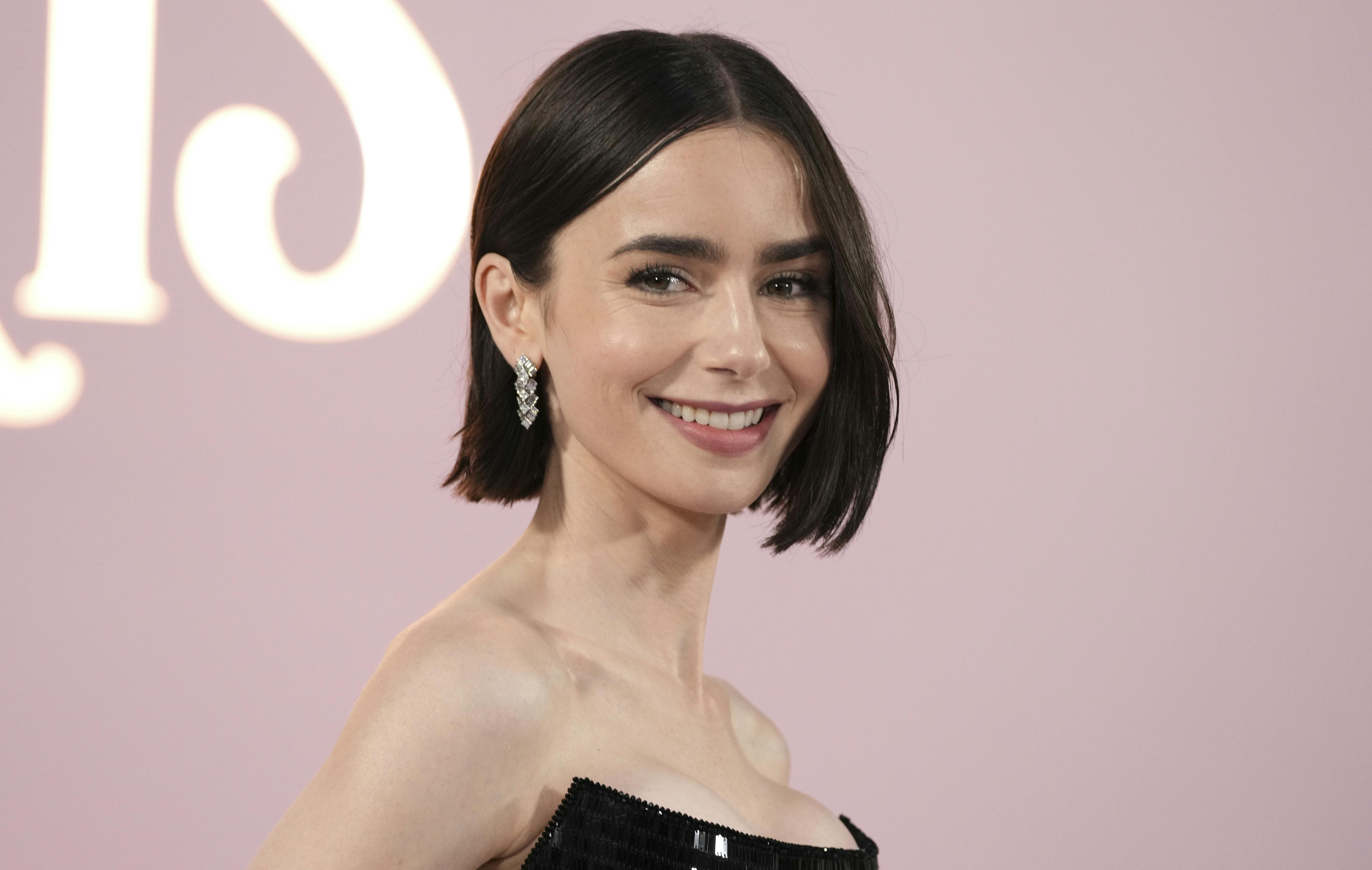 Lily Collins arrives at the premiere of "Emily in Paris" at the Egyptian Theatre, Wednesday, Aug. 14, 2024, in Los Angeles. (Photo by Jordan Strauss/Invision/AP)