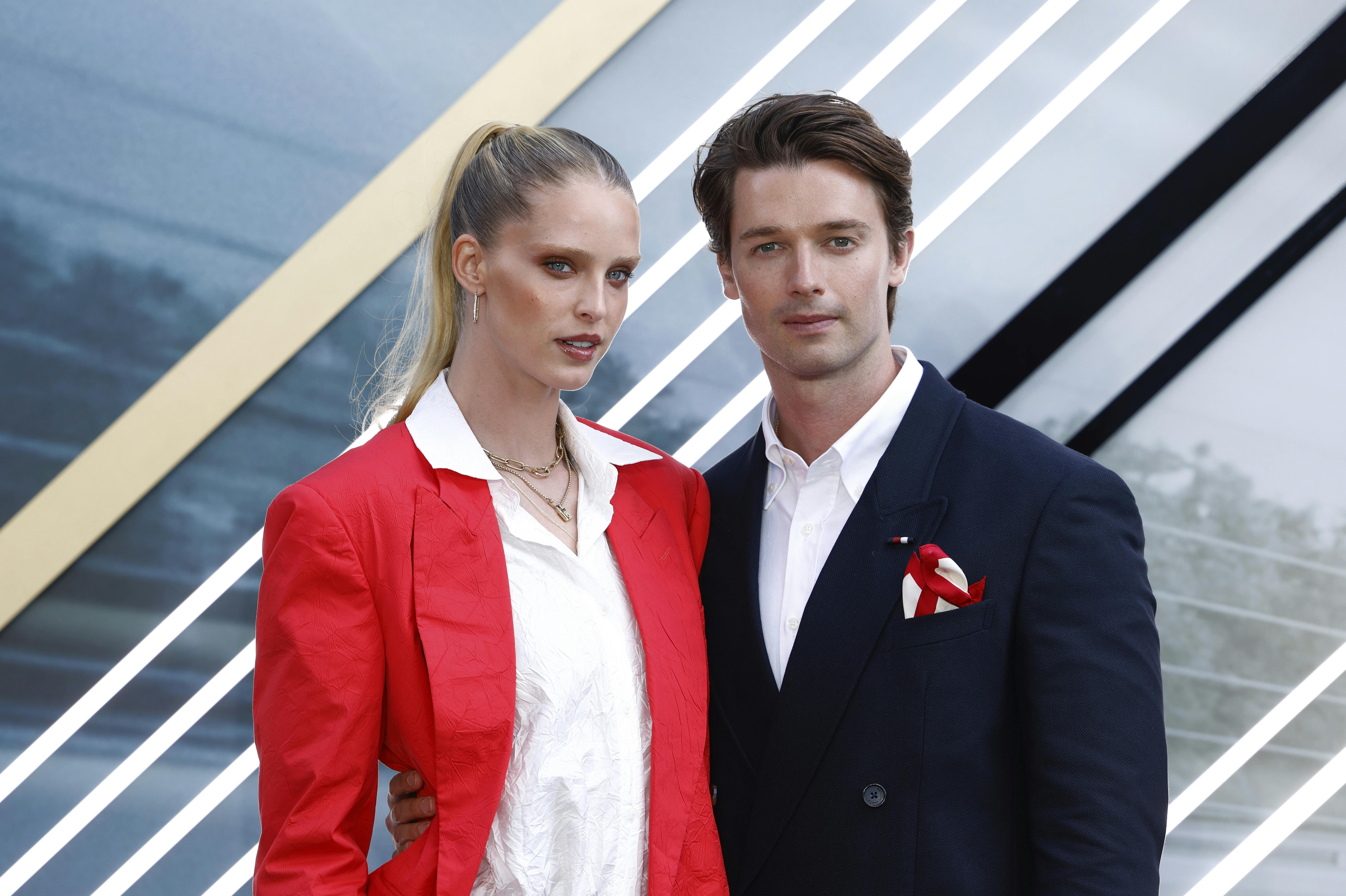 Abby Champion, left, and Patrick Schwarzenegger pose for photographers upon arrival at the premiere of the film 'F1 The Movie' on Monday, June 23, 2025, in London. (Photo by Millie Turner/Invision/AP)