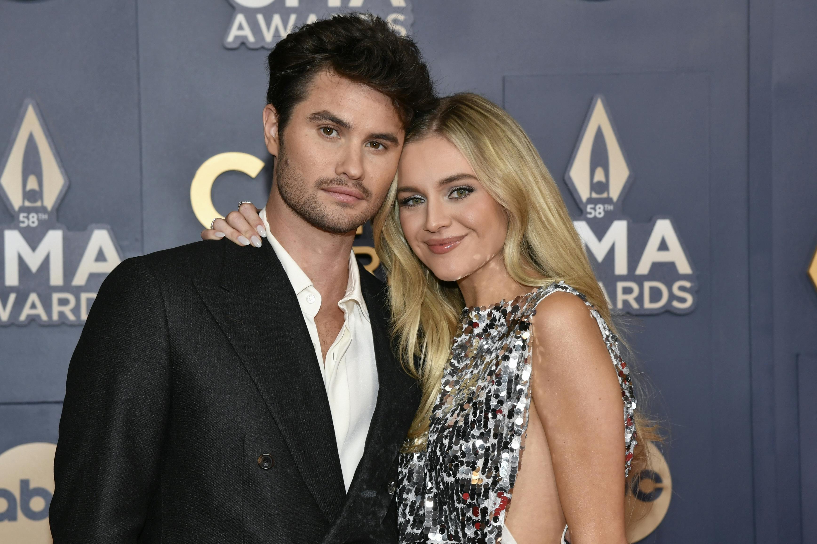 Chase Stokes, left, and Kelsea Ballerini arrive at the 58th Annual CMA Awards on Wednesday, Nov. 20, 2024, at Bridgestone Arena in Nashville, Tenn. (Photo by Evan Agostini/Invision/AP)