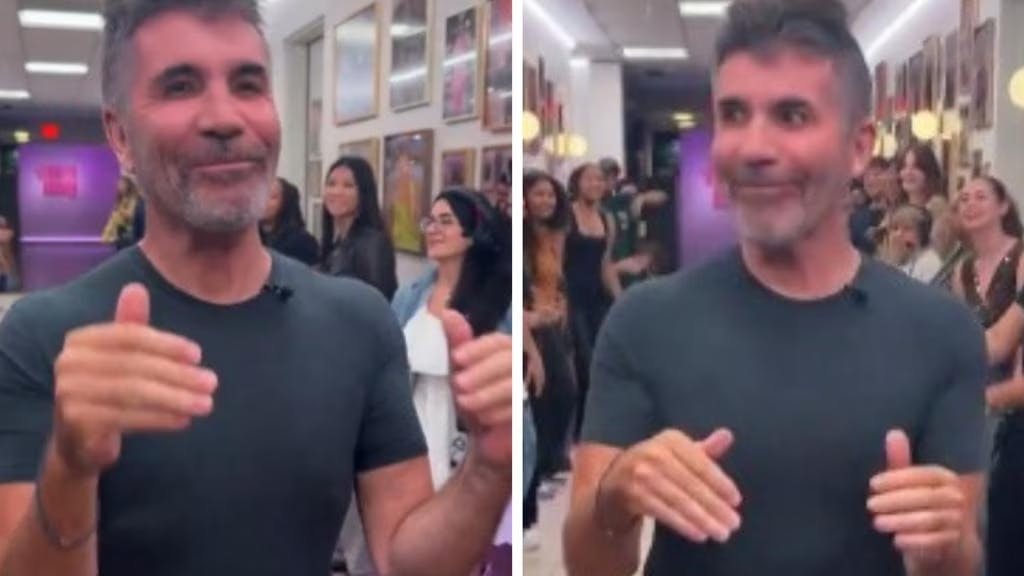 Simon Cowell får drøje hug for sit forsøg på at danse sig ind til interview.