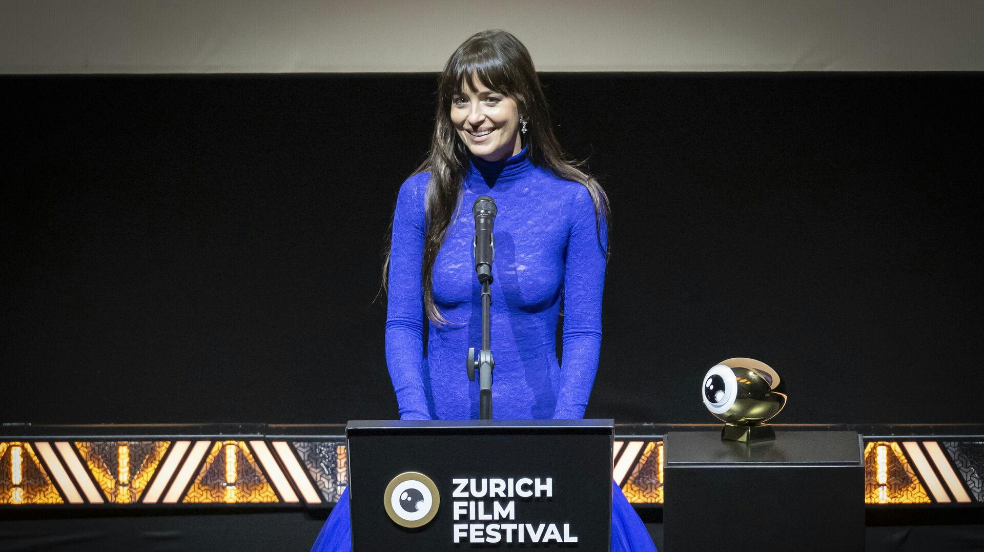 epa12405701 US actor and film producer Dakota Johnson