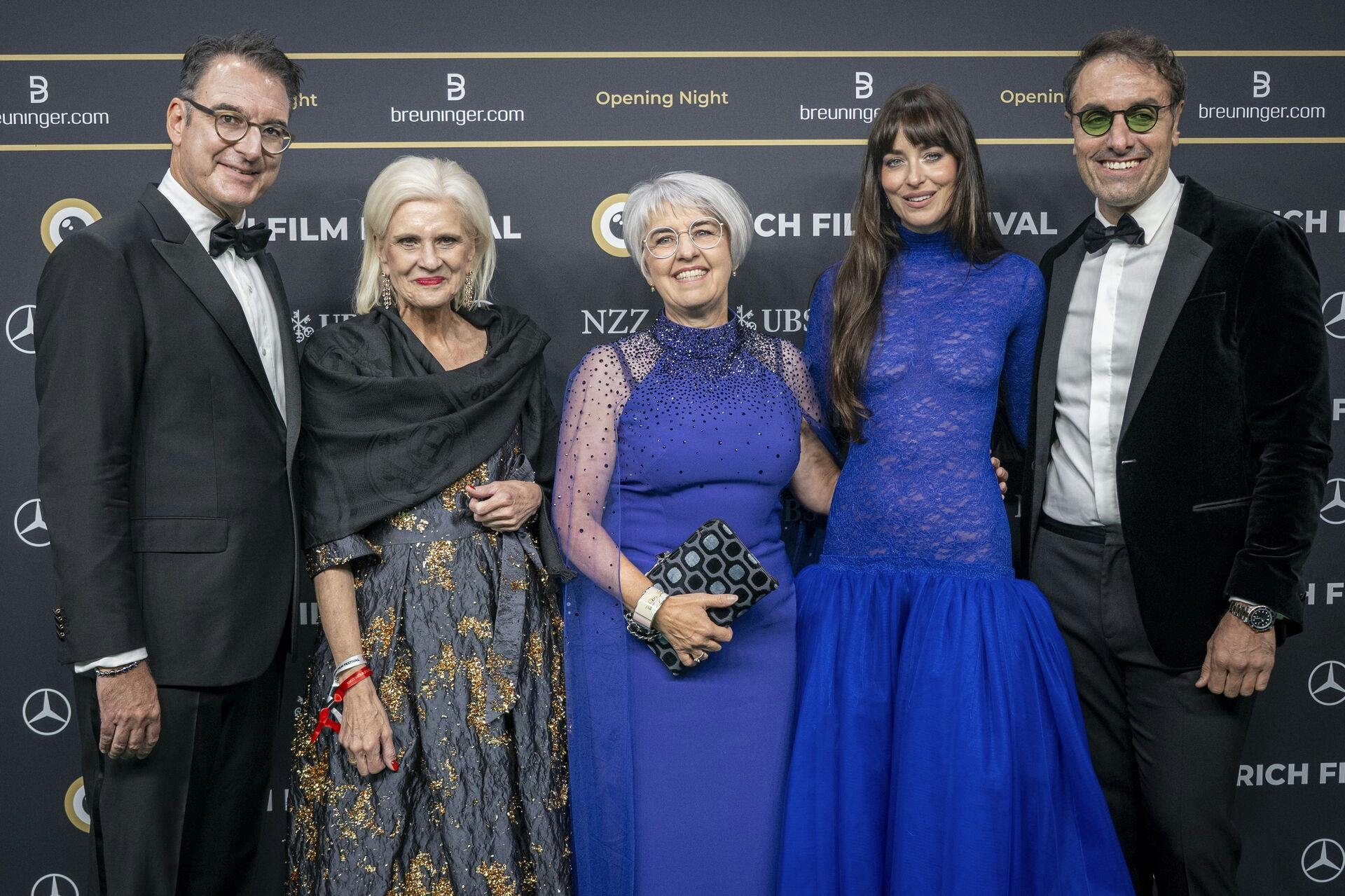 epa12405802 (L-R) ZFF Artistic Director Christian Jungen, ZFF President Doris Fiala, Swiss Federal Councillor Elisabeth Baume-Schneider, US actor and film producer Dakota Johnson and US film director and actor Michael Angelo Covino pose on the green carpet at the opening day of the Zurich Film Festival (ZFF), in Zurich, Switzerland, 25 September 2025. The 21st edition of the ZFF runs from 25 September to 05 October 2025. EPA/ANDREAS BECKER