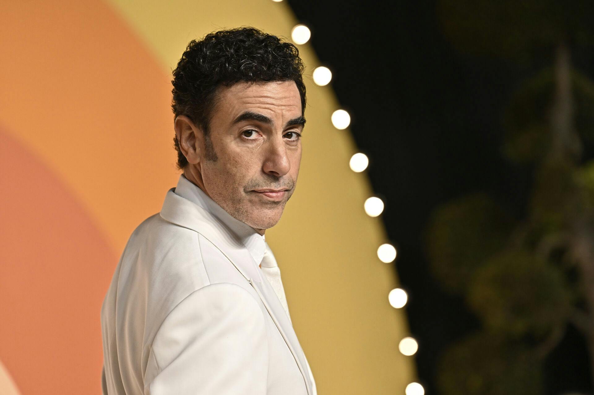 Sacha Baron Cohen arrives at the Vanity Fair Oscar Party on Sunday, March 2, 2025, at the Wallis Annenberg Center for the Performing Arts in Beverly Hills, Calif. (Photo by Evan Agostini/Invision/AP)