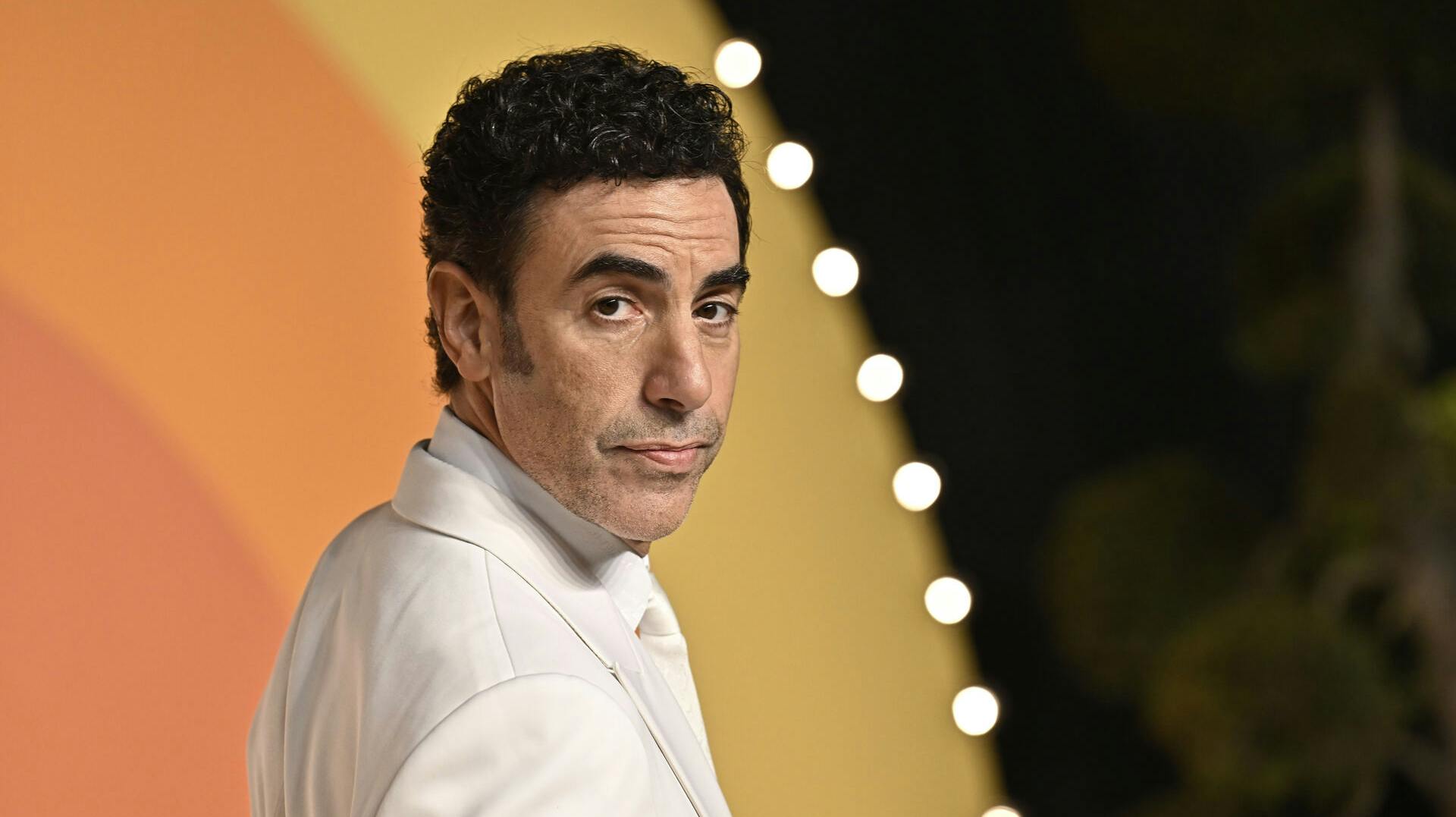 Sacha Baron Cohen arrives at the Vanity Fair Oscar Party on Sunday, March 2, 2025, at the Wallis Annenberg Center for the Performing Arts in Beverly Hills, Calif. (Photo by Evan Agostini/Invision/AP)