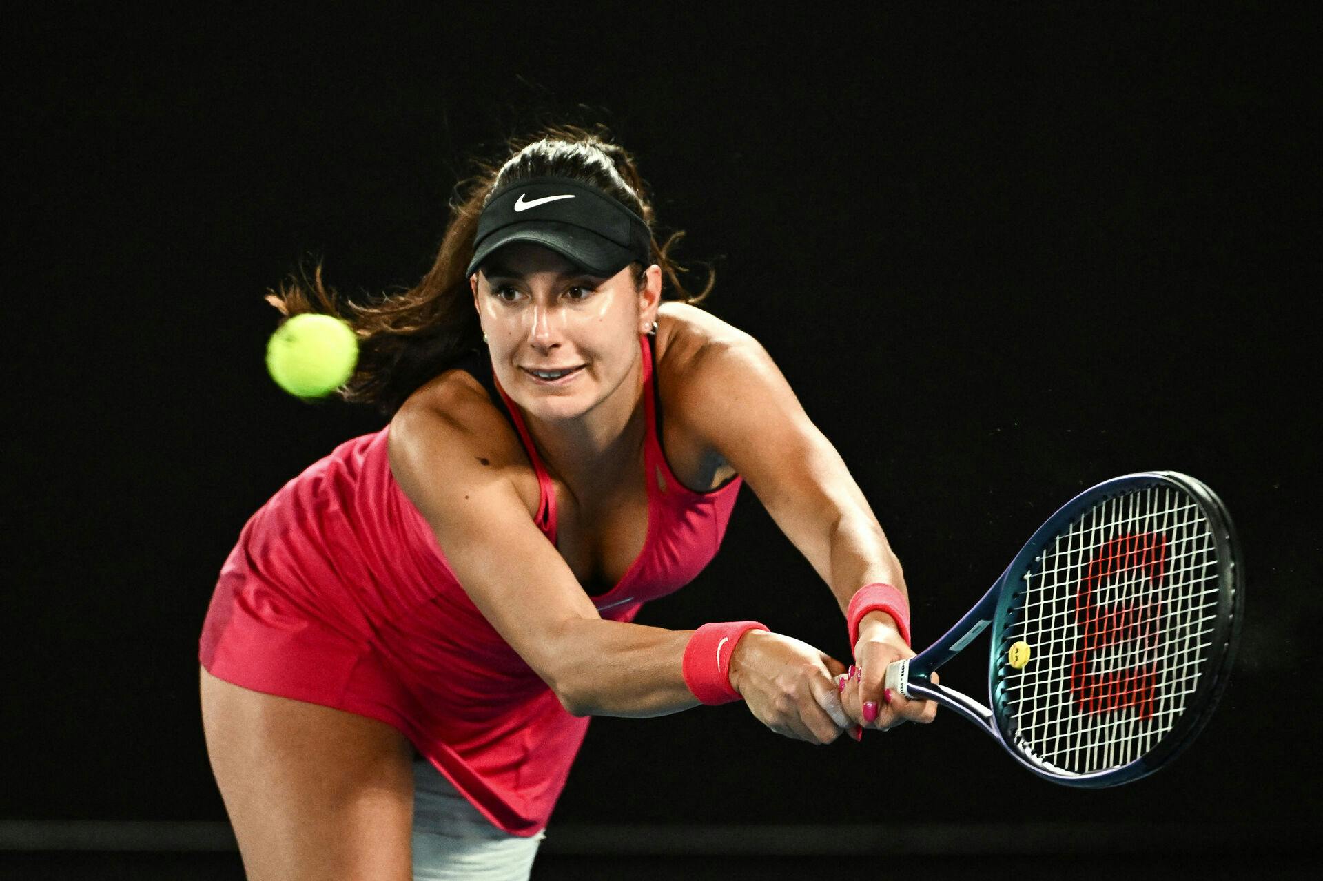 France's Oceane Dodin hits a return against China's Zheng Qinwen during their women's singles match on day nine of the Australian Open tennis tournament in Melbourne on January 22, 2024. Lillian SUWANRUMPHA / AFP