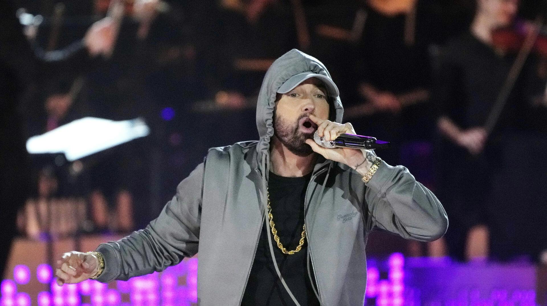 Eminem performs during "Live From Detroit: The Concert at Michigan Central" on Thursday, June 6, 2024, in Detroit. (AP Photo/Carlos Osorio)