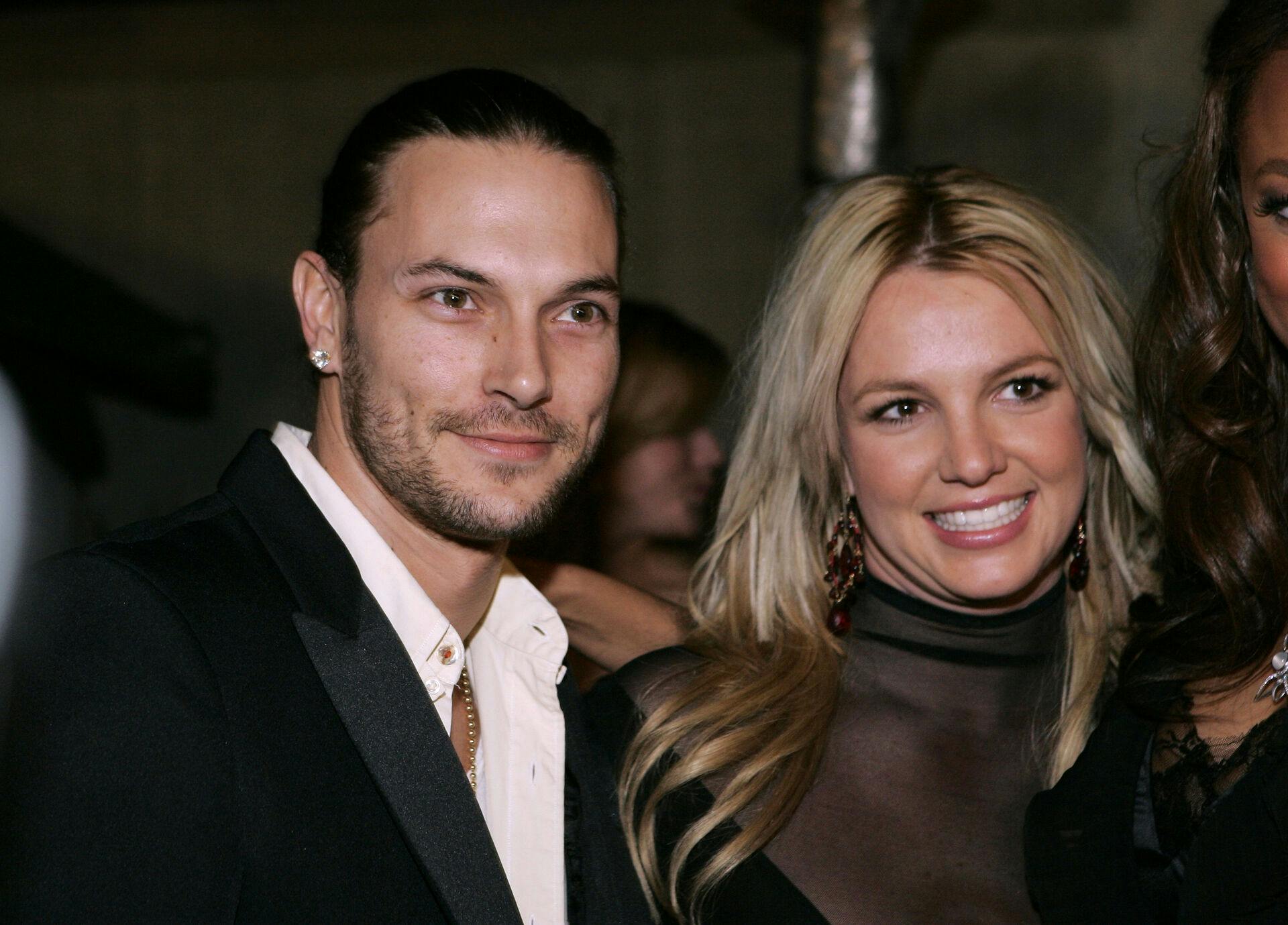 FILE - Britney Spears, right, and her husband Kevin Federline arrive for a post Grammy party in Beverly Hills, Calif., on Feb. 8, 2006. (AP Photo/Danny Moloshok, File)