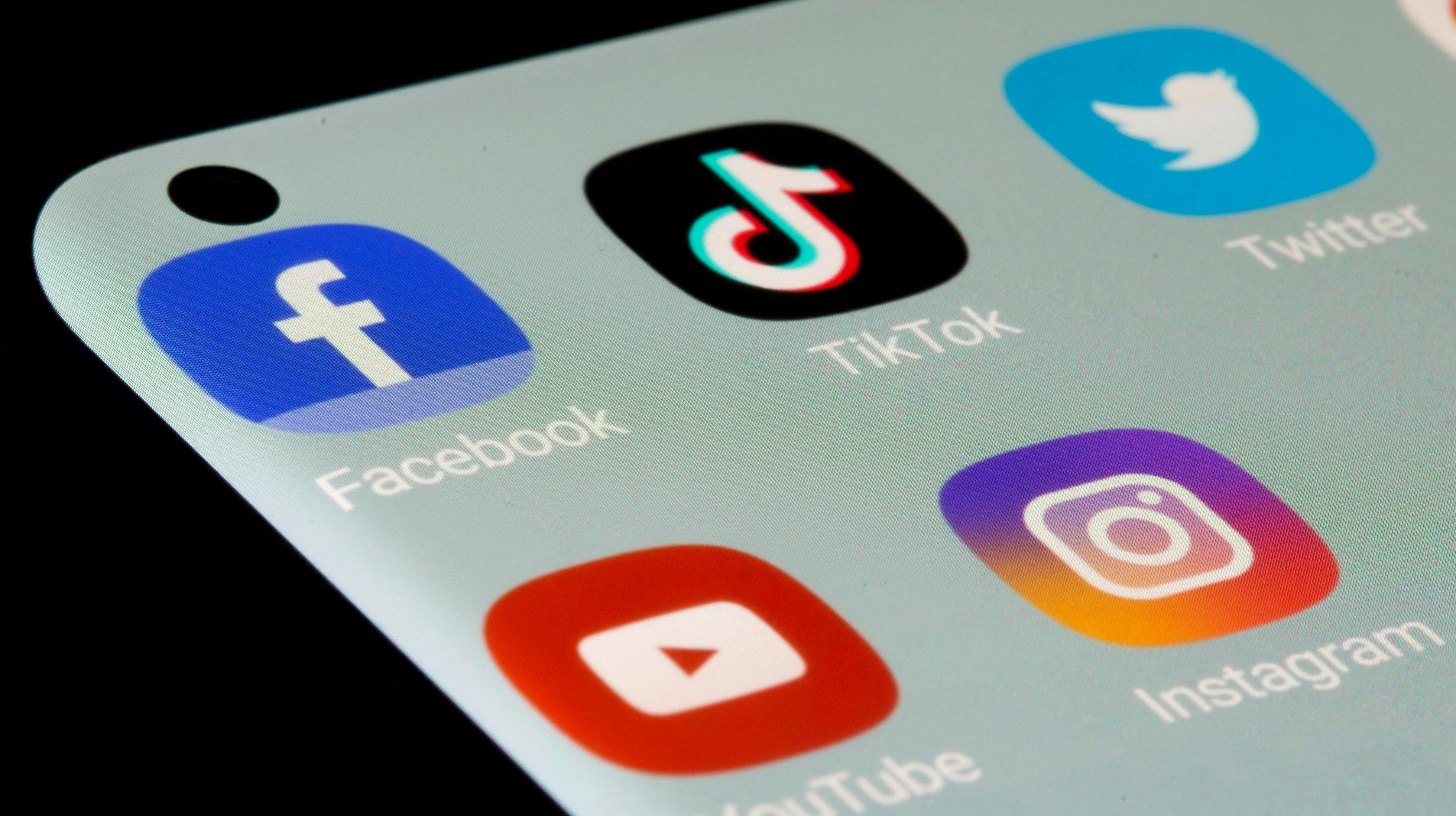FILE PHOTO: Facebook, TikTok, Twitter, YouTube and Instagram apps are seen on a smartphone in this illustration taken, July 13, 2021. REUTERS/Dado Ruvic/Illustration/File Photo