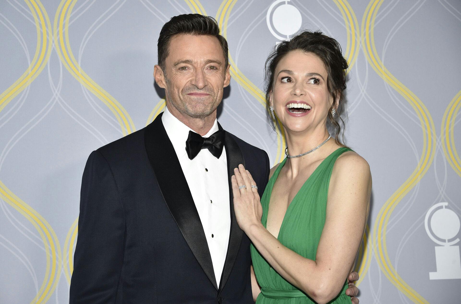 Hugh Jackman, left, and Sutton Foster arrive at the 75th annual Tony Awards on Sunday, June 12, 2022, at Radio City Music Hall in New York. (Photo by Evan Agostini/Invision/AP)