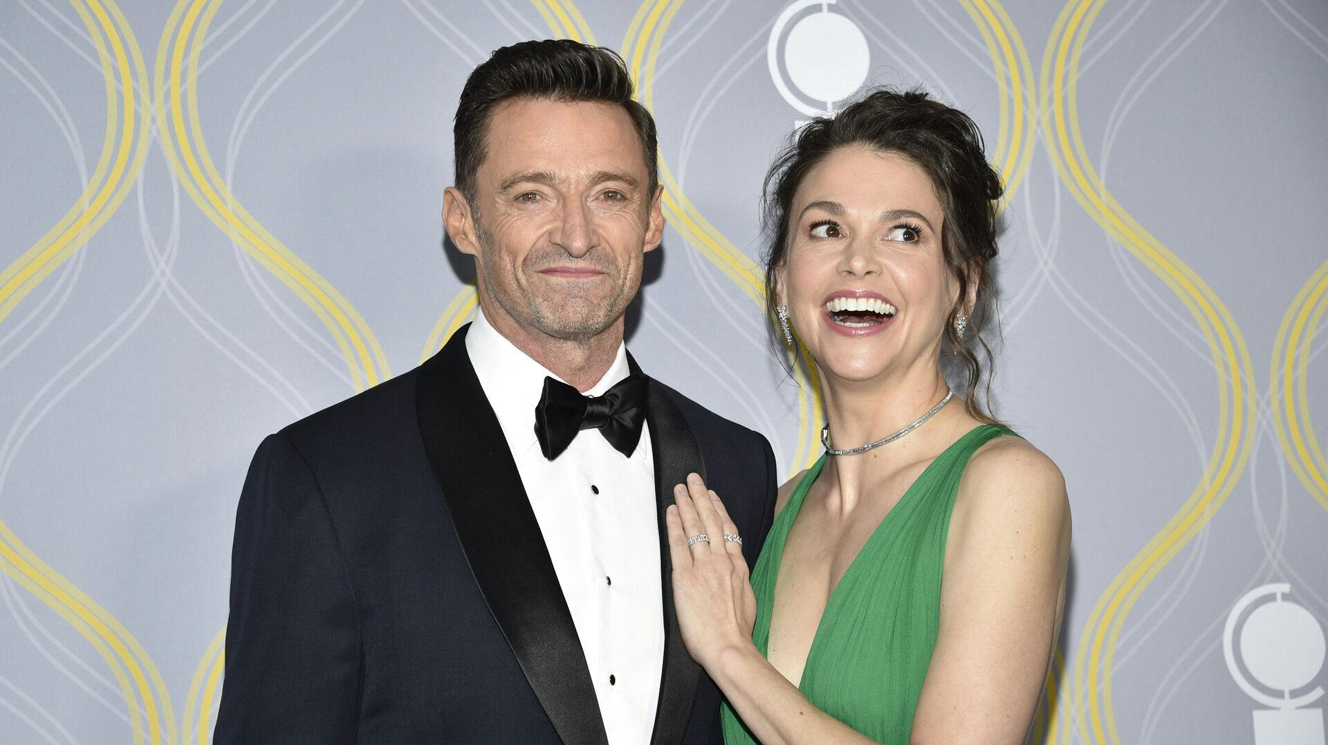 Hugh Jackman, left, and Sutton Foster arrive at the 75th annual Tony Awards on Sunday, June 12, 2022, at Radio City Music Hall in New York. (Photo by Evan Agostini/Invision/AP)