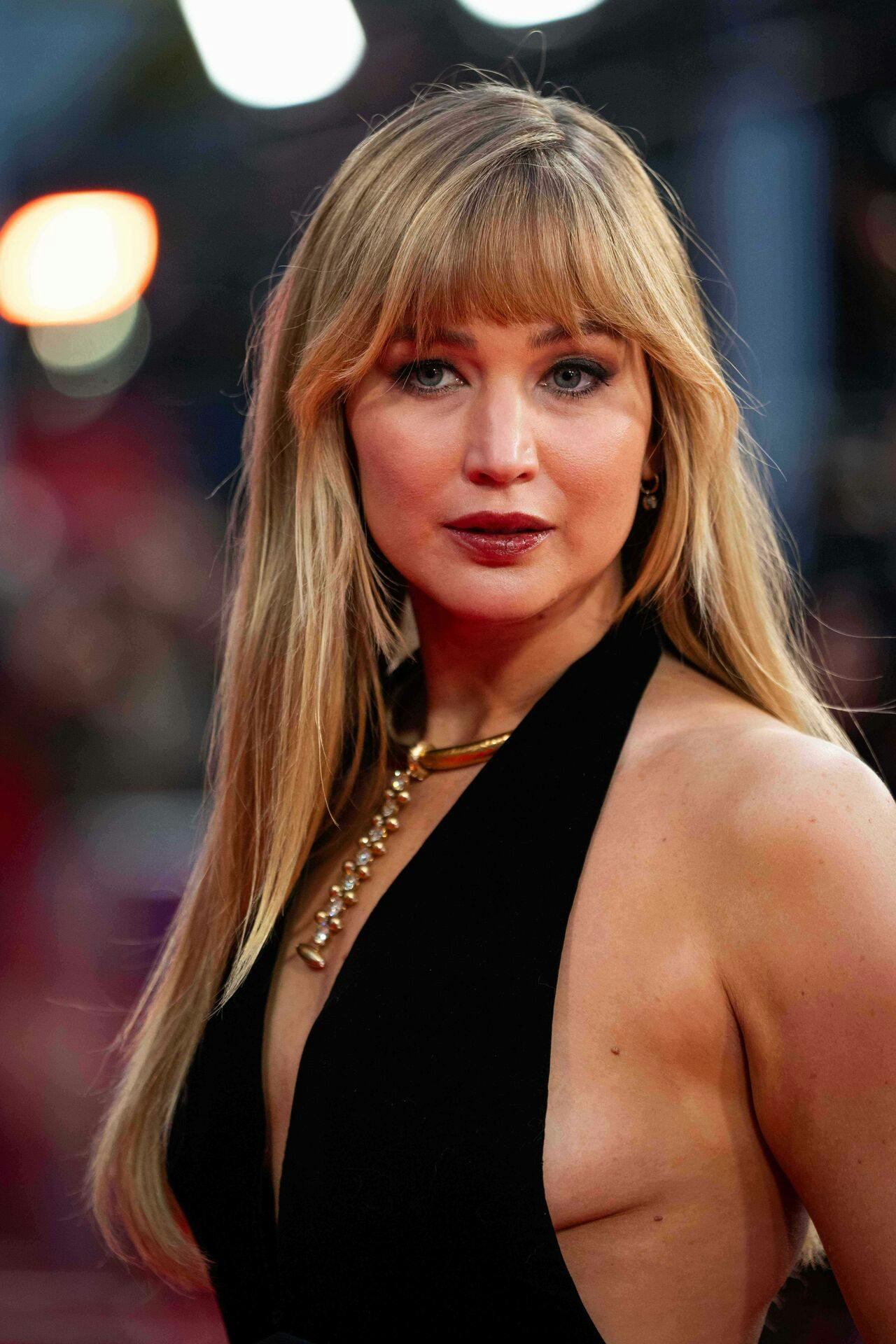 Jennifer Lawrence poses for photographers upon arrival at the premiere of the film "Die My Love" during the London film festival in London, Friday, Oct. 17, 2025. (Photo by Scott A Garfitt/Invision/AP)