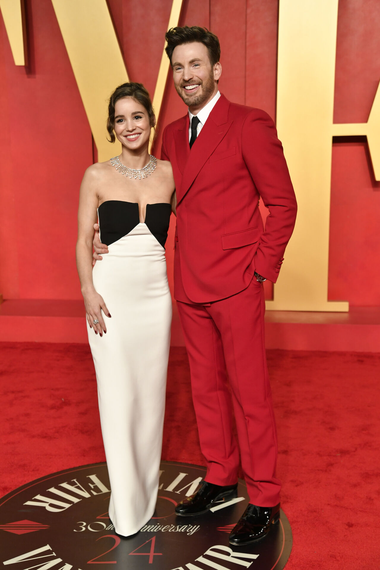 Alba Baptista, left, and Chris Evans arrive at the Vanity Fair Oscar Party on Sunday, March 10, 2024, at the Wallis Annenberg Center for the Performing Arts in Beverly Hills, Calif. (Photo by Evan Agostini/Invision/AP)