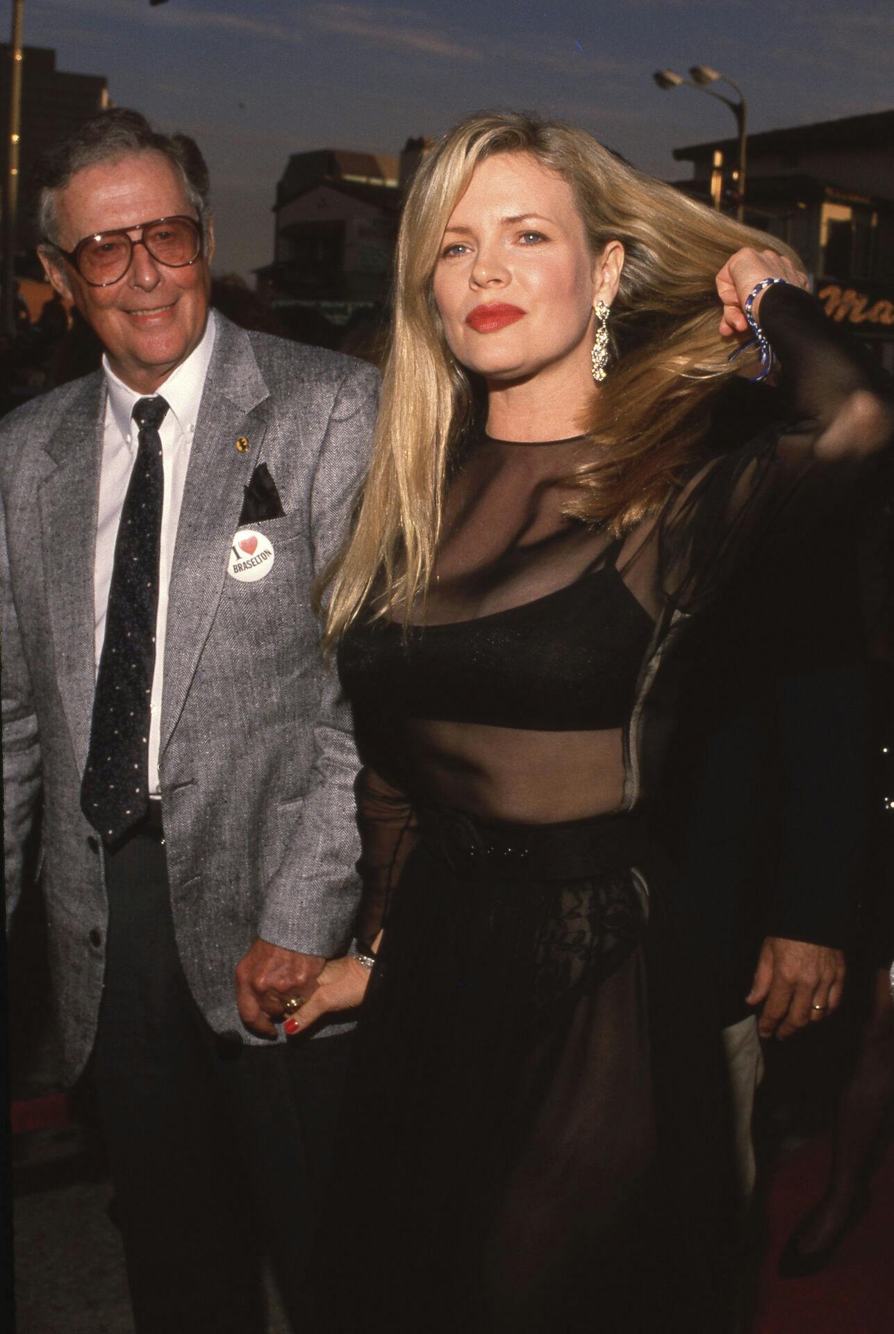 Kim Basinger and father at the Batman Los Angeles Premiere June 19, 1989 Credit: Ralph Dominguez/MediaPunch /IPX