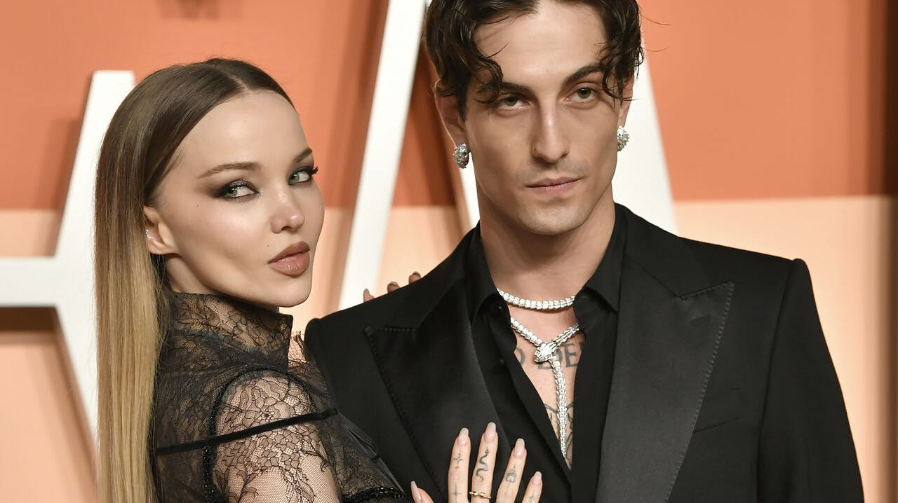 Cameron Dove, left, and Damiano David arrive at the Vanity Fair Oscar Party on Sunday, March 2, 2025, at the Wallis Annenberg Center for the Performing Arts in Beverly Hills, Calif. (Photo by Evan Agostini/Invision/AP)
