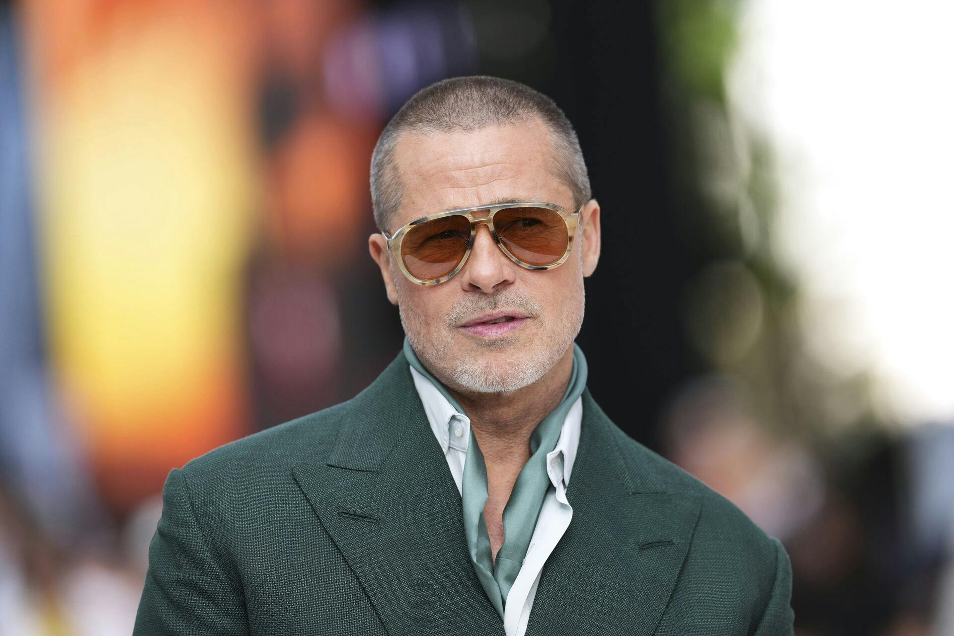 FILE - Brad Pitt poses for photographers upon arrival at the premiere of the film 'F1 The Movie' on Monday, June 23, 2025, in London. (Photo by Scott A Garfitt/Invision/AP, file)