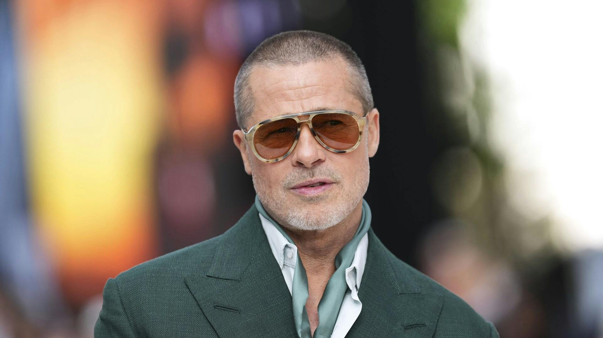 FILE - Brad Pitt poses for photographers upon arrival at the premiere of the film 'F1 The Movie' on Monday, June 23, 2025, in London. (Photo by Scott A Garfitt/Invision/AP, file)