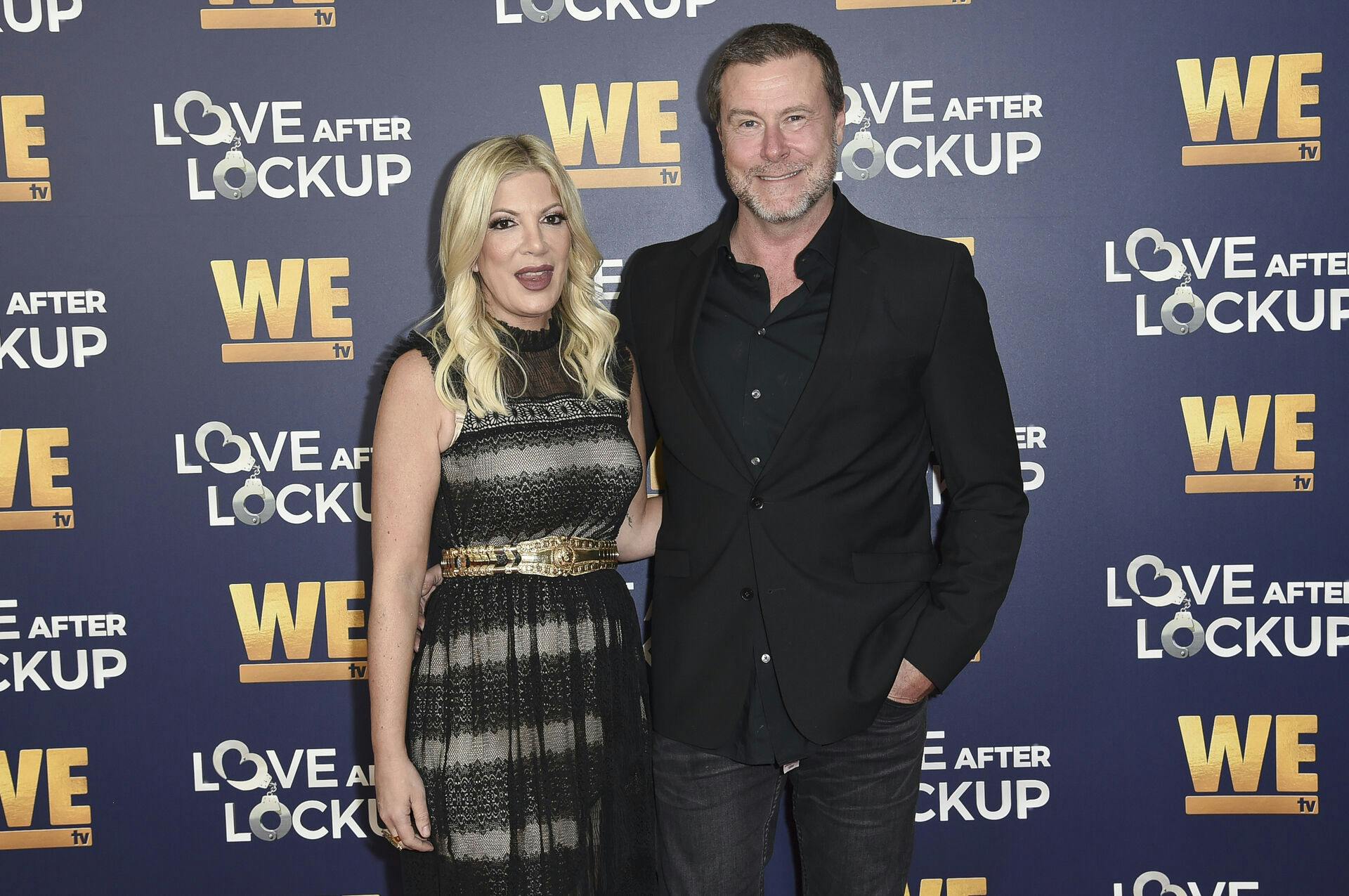 FILE - Tori Spelling, left, and Dean McDermott atten