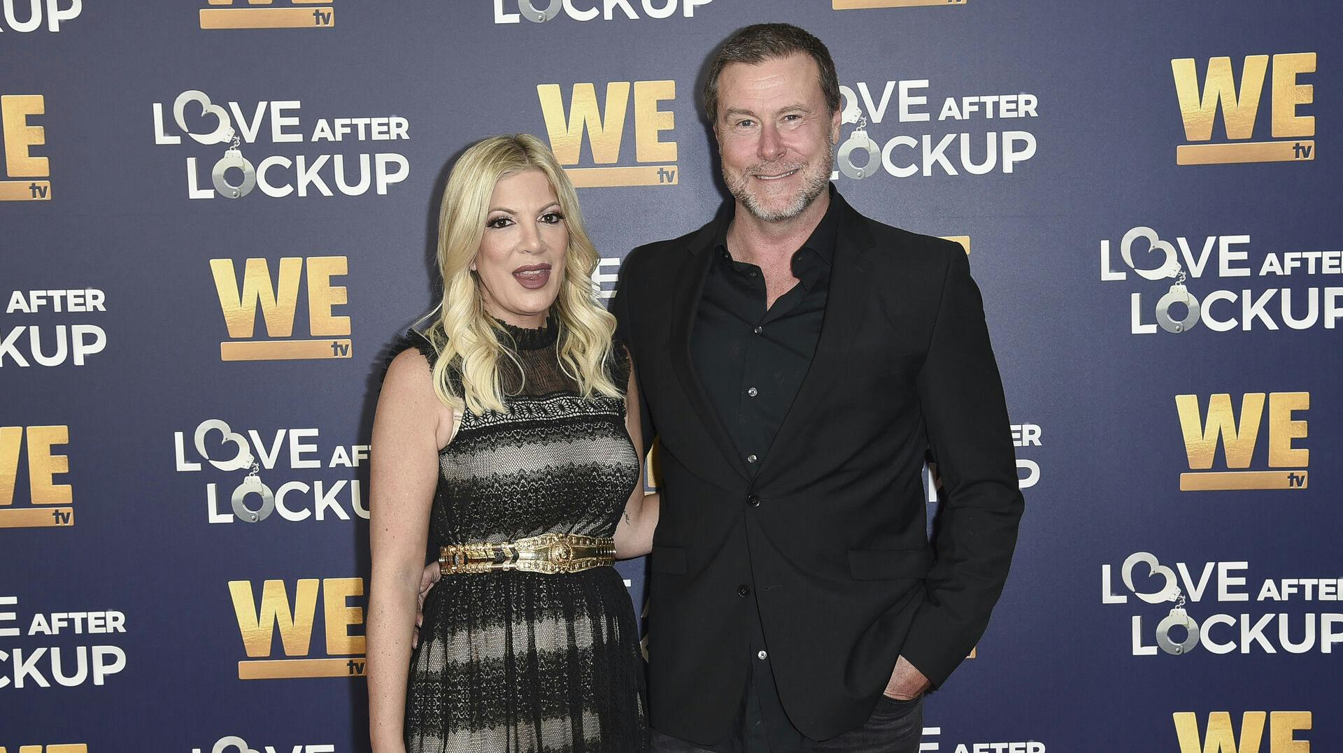 FILE - Tori Spelling, left, and Dean McDermott atten