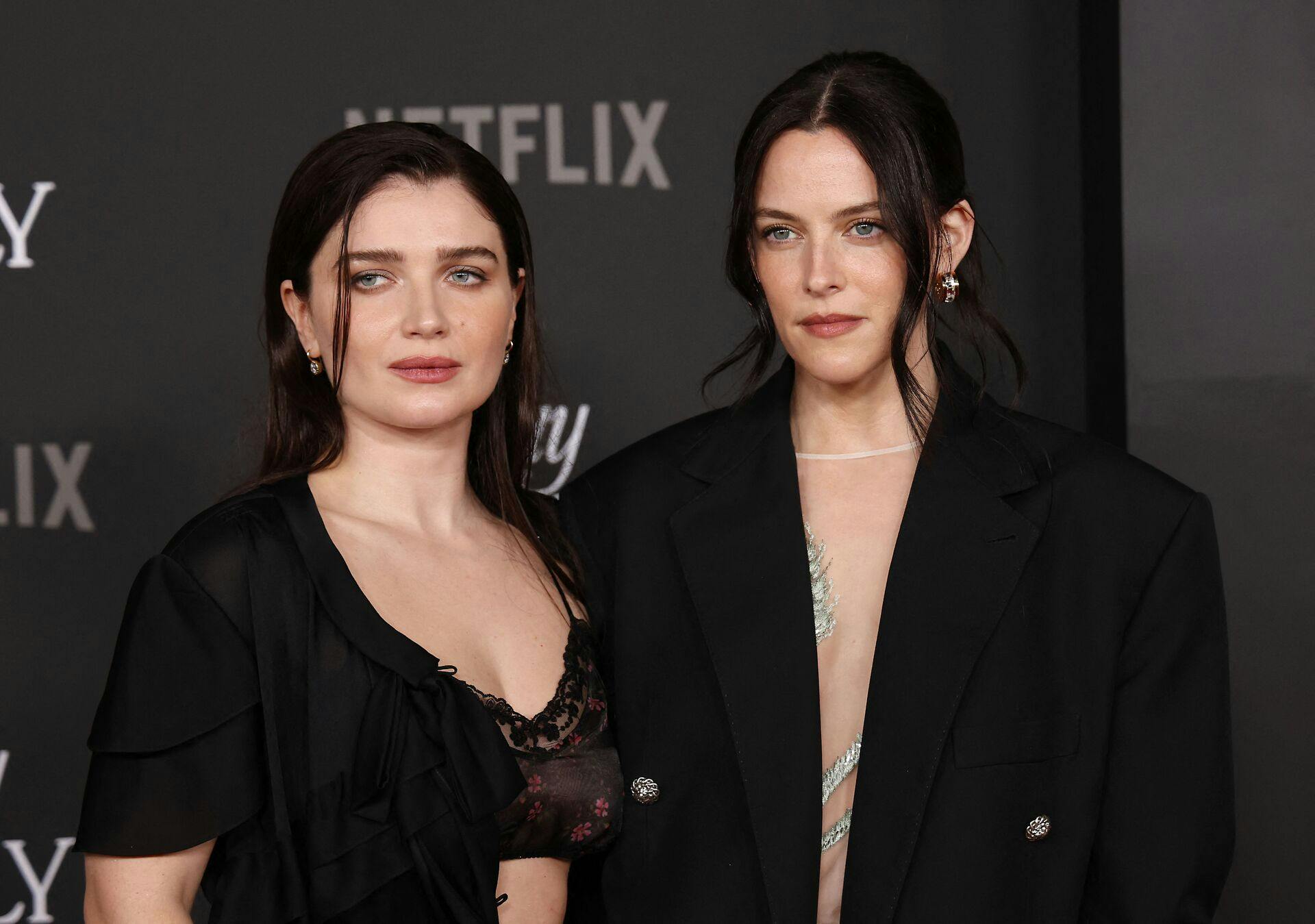 US actress Riley Keough (R) and Irish actress Eve Hewson attend the premiere of Netflix's "Jay Kelly" at the Egyptian Theater in Los Angeles on November 11, 2025. (Photo by Michael Tran / AFP)