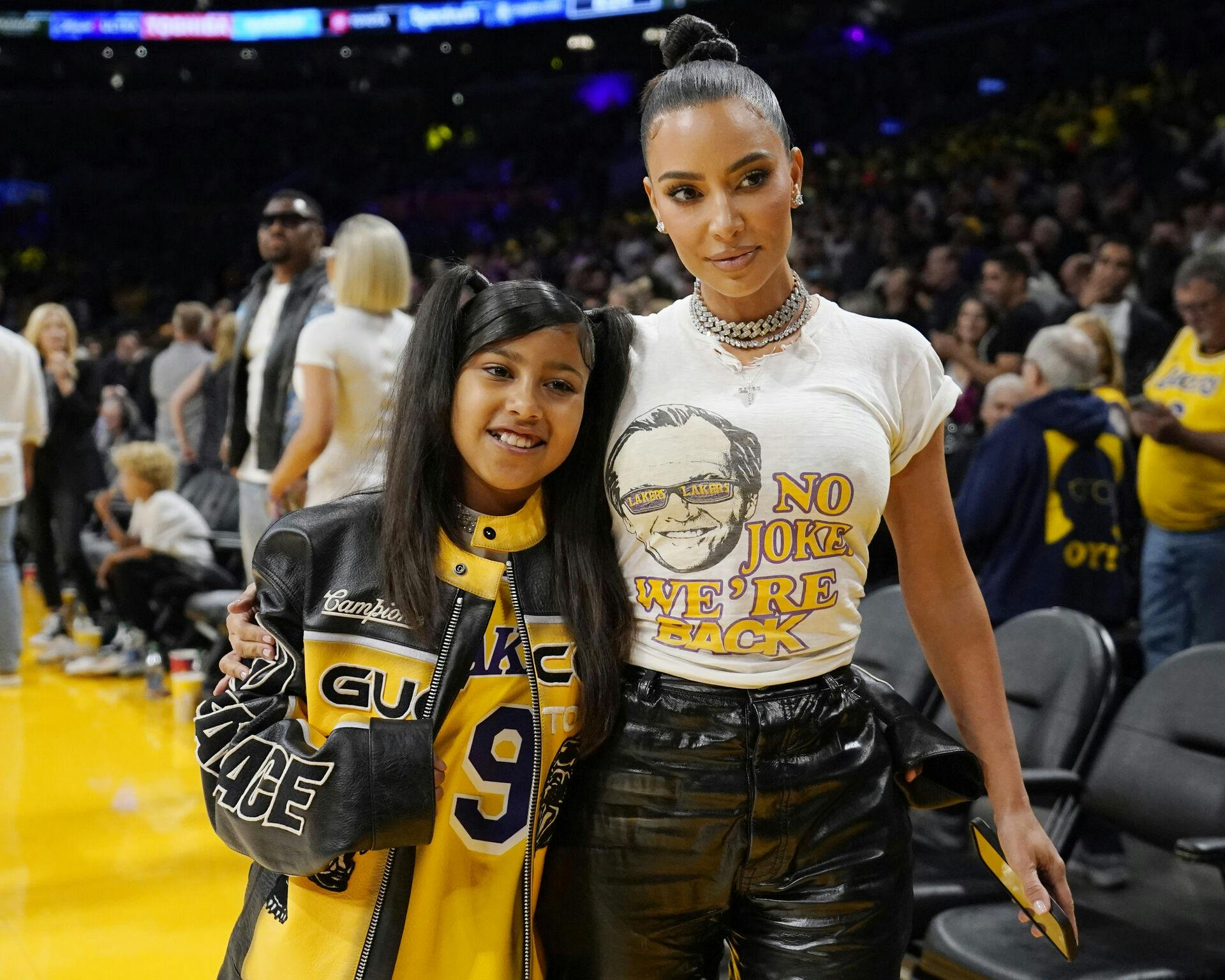 FILE - Kim Kardashian poses for a photo with d