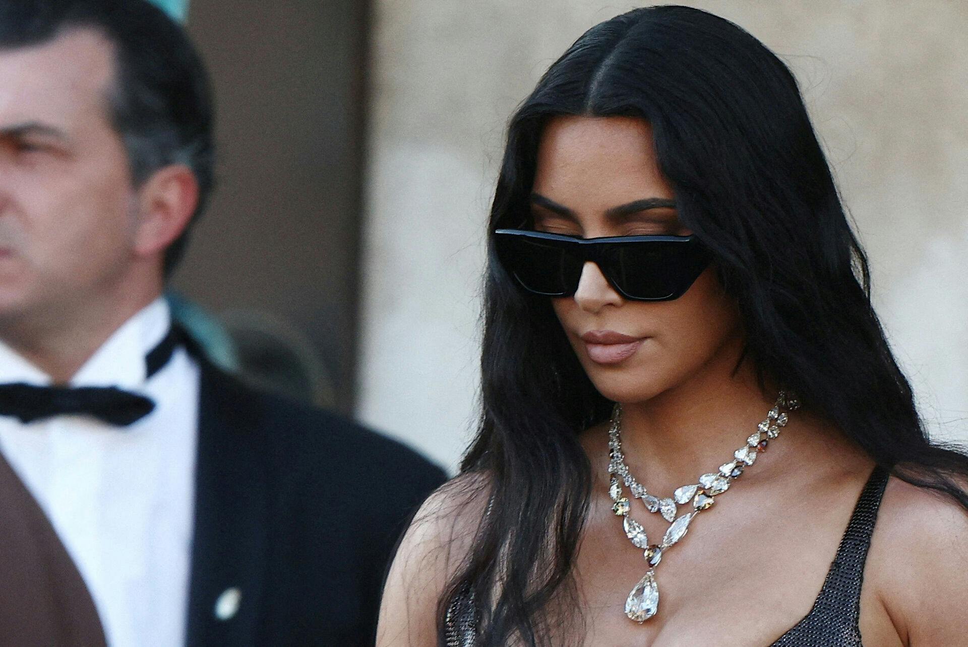 FILE PHOTO: Kim Kardashian leaves Gritti Palace, on the second day of the wedding festivities of Amazon founder Jeff Bezos and journalist Lauren Sanchez, in Venice, Italy, June 27, 2025. REUTERS/Guglielmo Mangiapane/File Photo