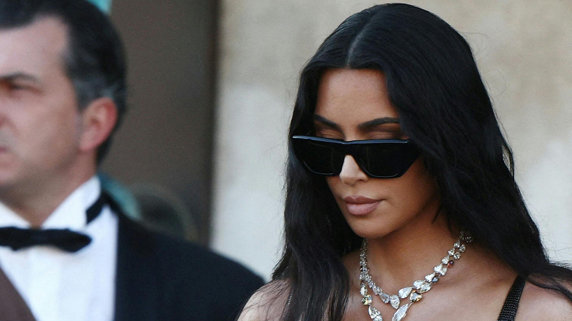 FILE PHOTO: Kim Kardashian leaves Gritti Palace, on the second day of the wedding festivities of Amazon founder Jeff Bezos and journalist Lauren Sanchez, in Venice, Italy, June 27, 2025. REUTERS/Guglielmo Mangiapane/File Photo