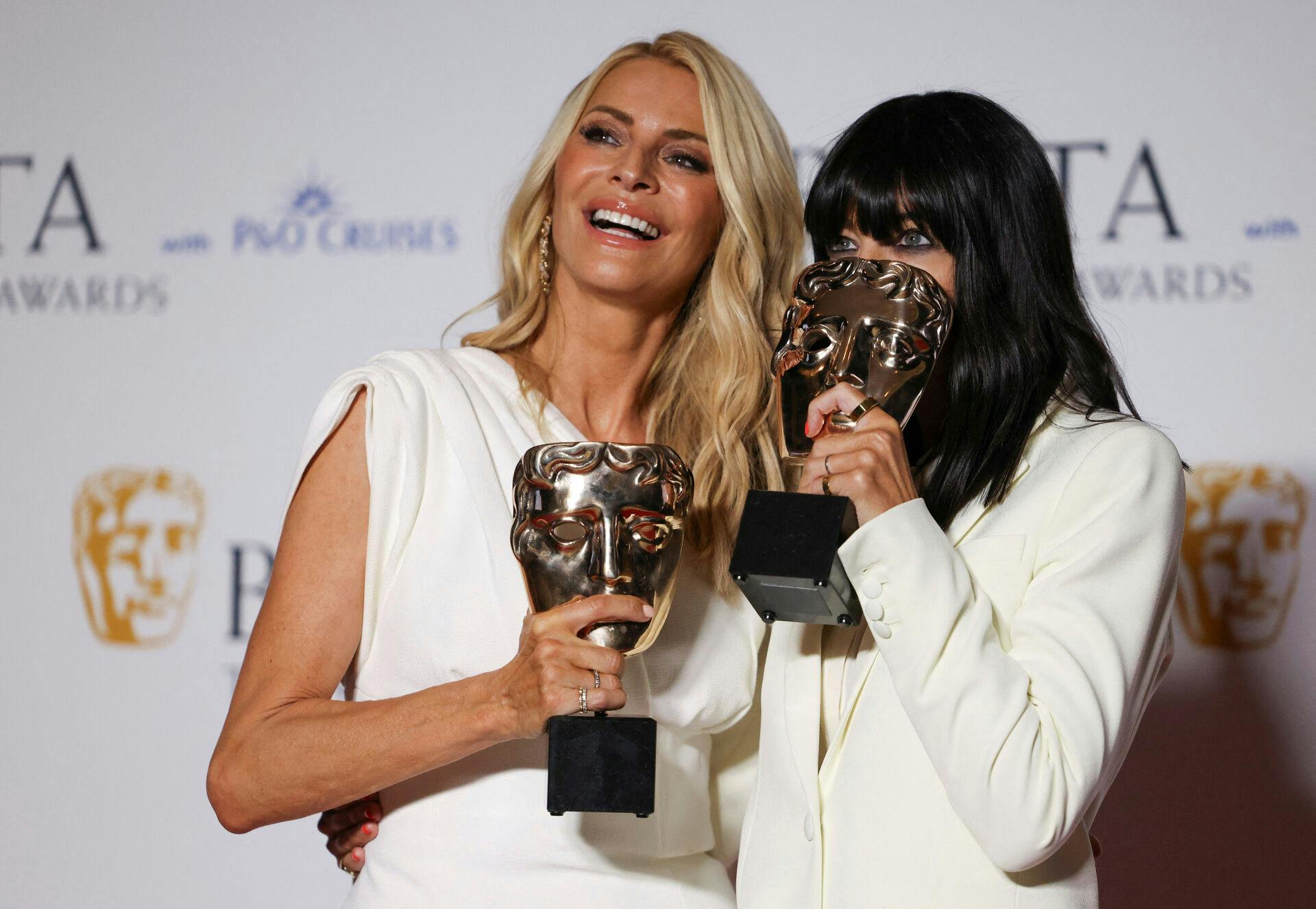 Tess Daly and Claudia Winkleman, winners of the Entertainment category for "Strictly Come Dancing", pose with awards at the 2024 BAFTA Television Awards in London, Britain, May 12, 2024. REUTERS/Hollie Adams TPX IMAGES OF THE DAY