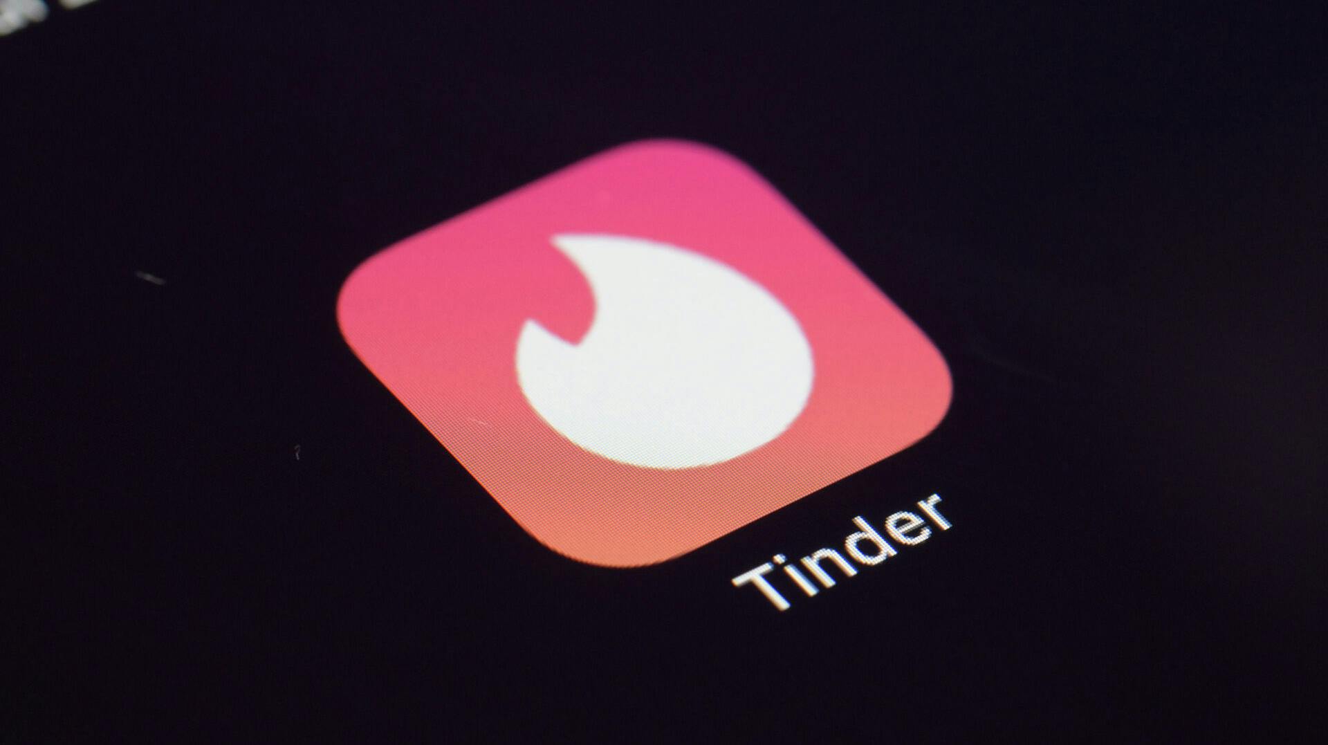FILE - The icon for the dating app Tinder appears on a device, July 28, 2020, in New York. (AP Photo/Patrick Sison, File)