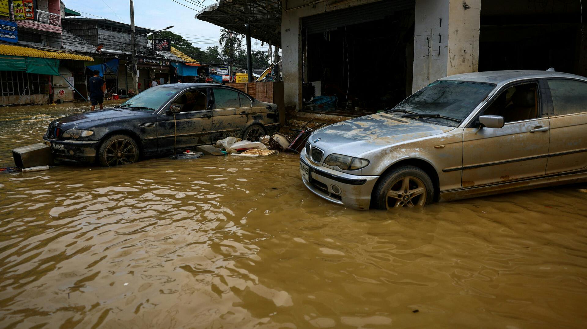 Damaged cars are parked in a flooded area in Hat Yai district, Songkhla province, Thailand, November 28, 2025. REUTERS/Athit Perawongmetha
