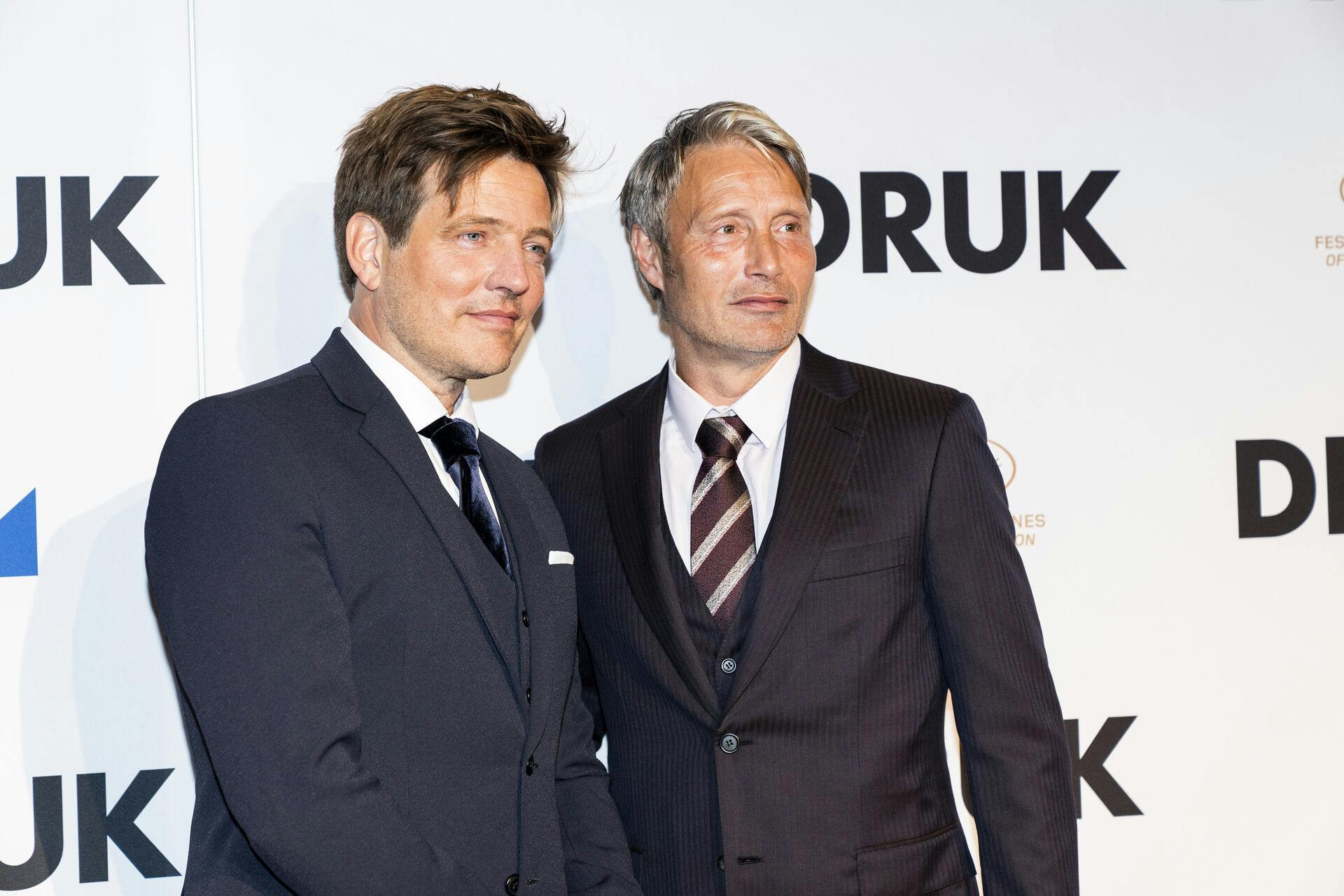 Instruktør Thomas Vinterberg og skuespiller Mads Mikkelsen ankommer, da Zentropa og Nordisk Film holder gallapremiere og rød løber på Thomas Vinterbergs drama Druk i Nordisk Film Biografer Imperial, onsdag den 23. september 2020.. (Foto: Ida Marie Odgaard/Ritzau Scanpix)