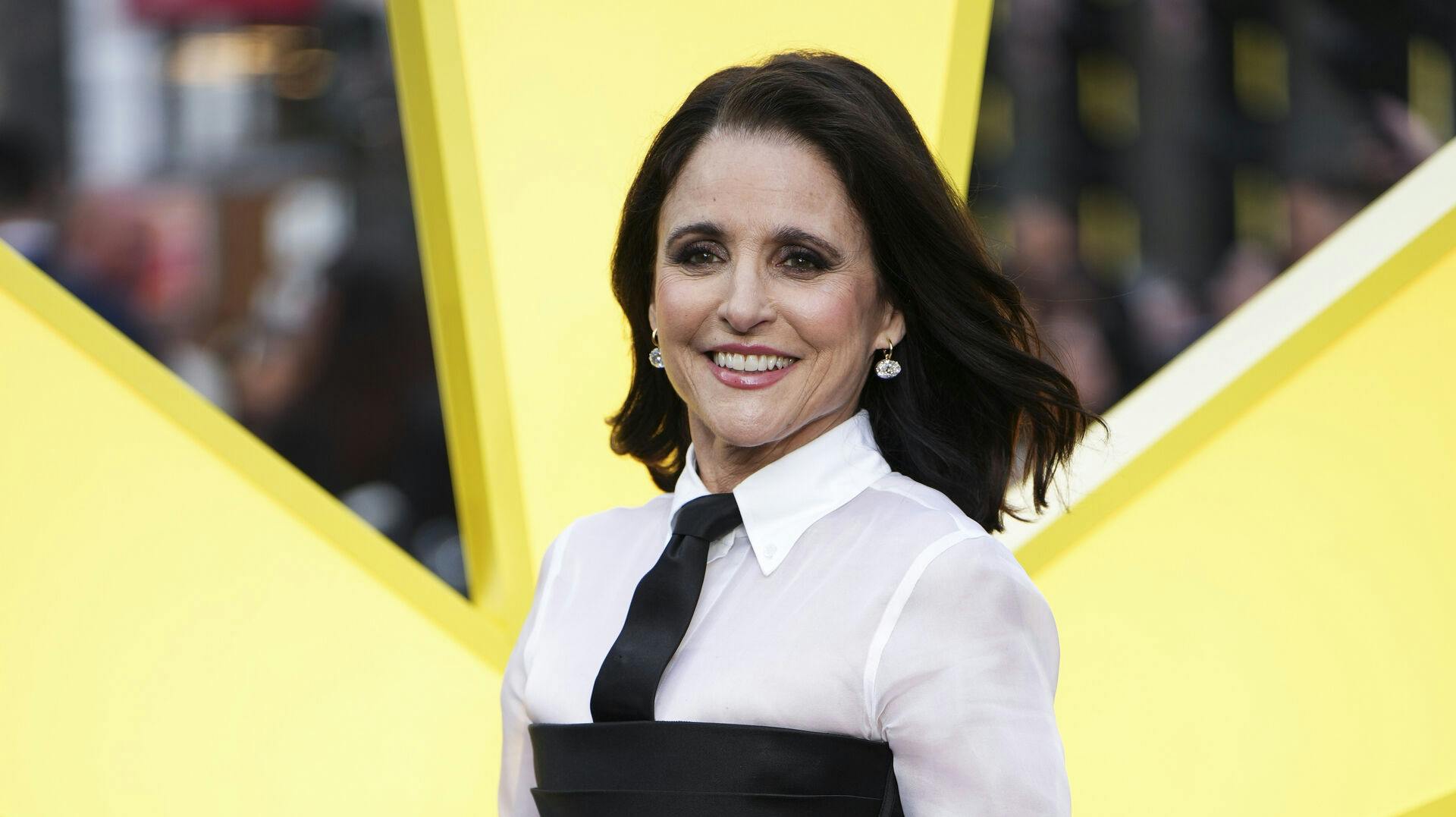 Julia Louis-Dreyfus poses for photographers upon arrival at a screening of the film 'Thunderbolts' on Tuesday, April 22, 2025, in London. (Photo by Scott A Garfitt/Invision/AP)