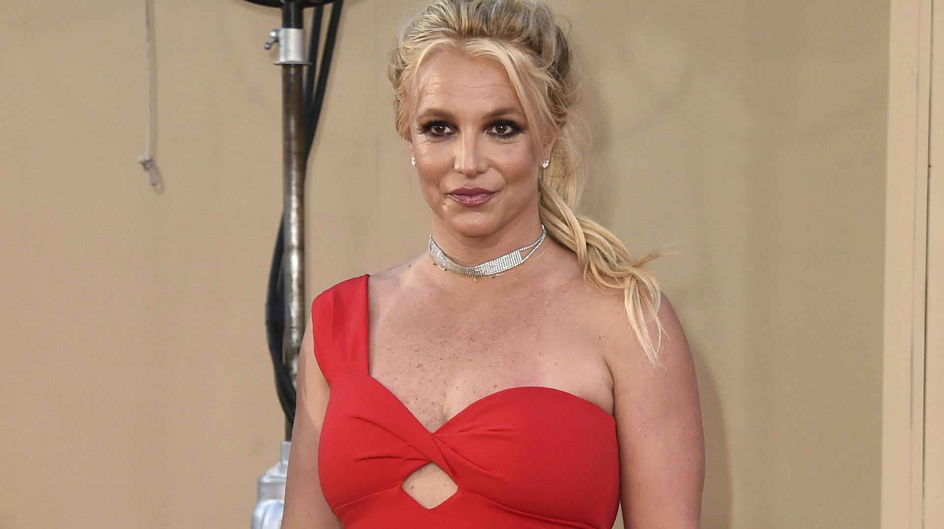 FILE - Britney Spears arrives at the Los Angeles premiere of "Once Upon a Time in Hollywood, " on July 22, 2019. Spear's highly anticipated memoir 'The Woman in Me' will be released Tuesday, Oct. 24, 2023. (Photo by Jordan Strauss/Invision/AP, File)
