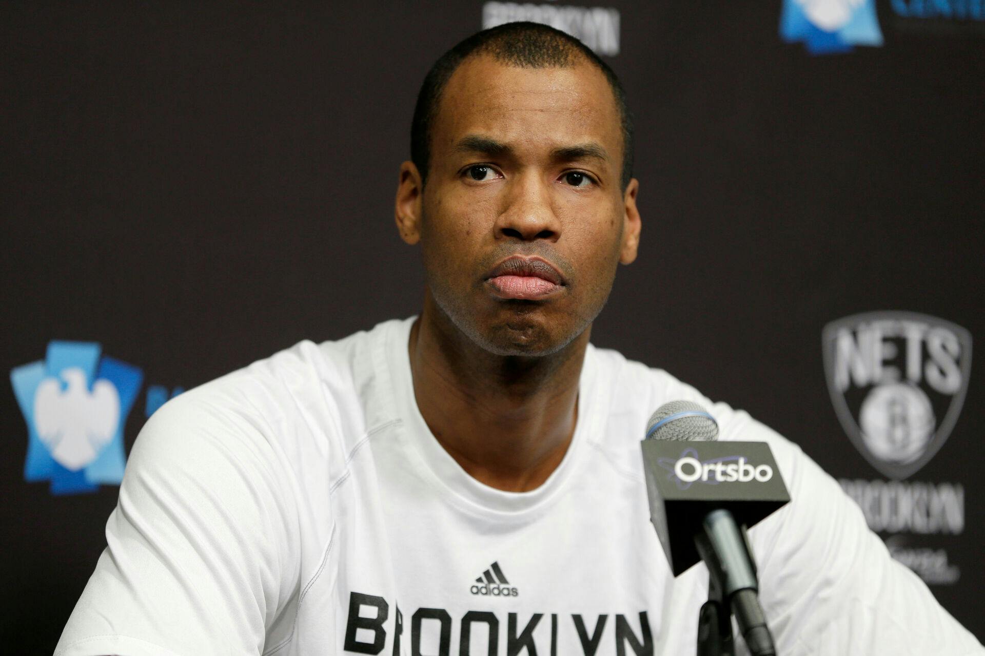 FILE - Brooklyn Nets Jason Collins speaks during a news conference before the NBA basketball game against the Chicago Bulls at the Barclays Center, Monday, March 3, 2014 in New York. (AP Photo/Seth Wenig, File)
