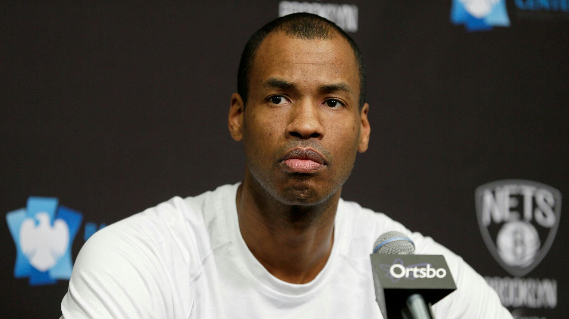FILE - Brooklyn Nets Jason Collins speaks during a news conference before the NBA basketball game against the Chicago Bulls at the Barclays Center, Monday, March 3, 2014 in New York. (AP Photo/Seth Wenig, File)