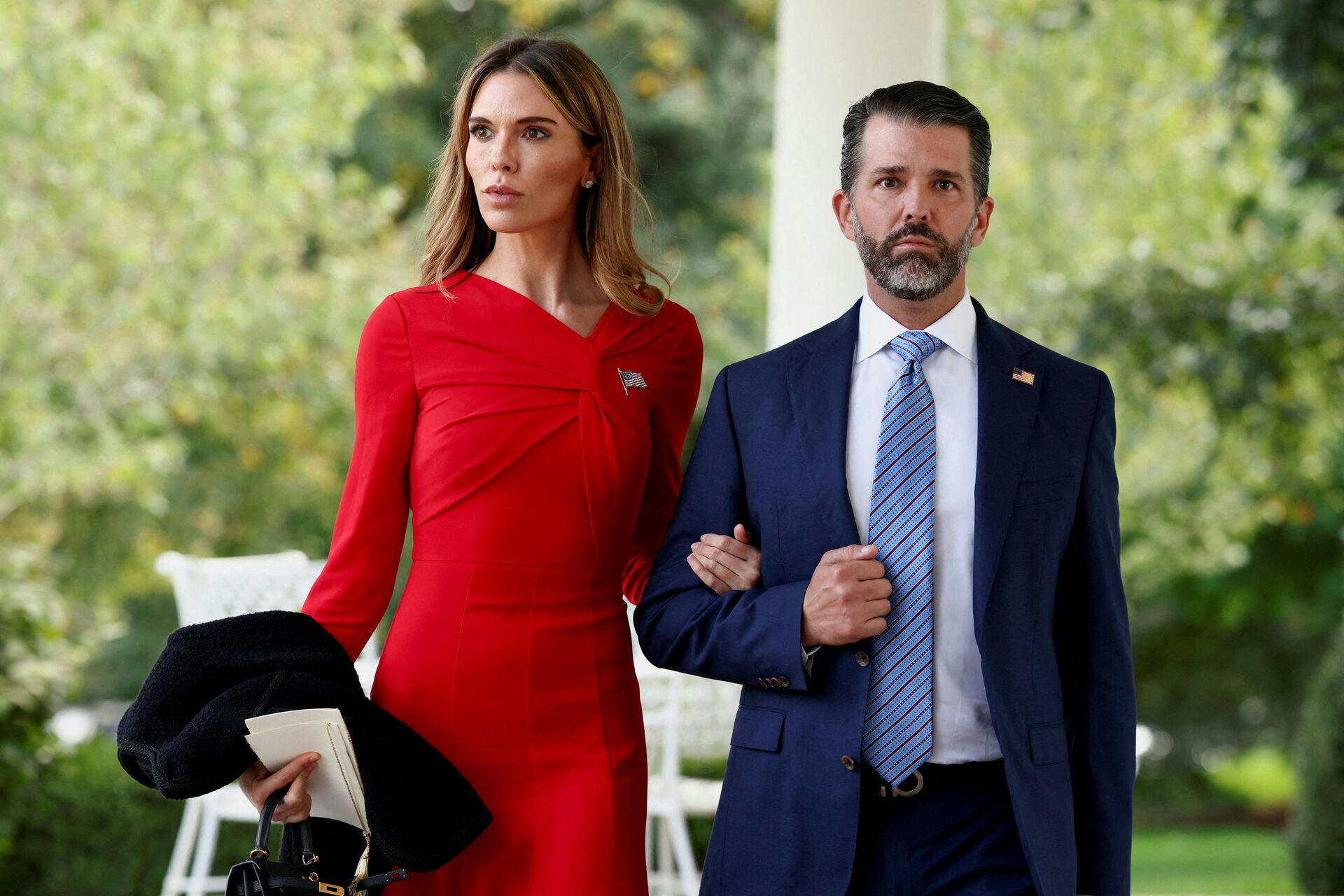 Donald Trump Jr. and Bettina Anderson attend a ceremony held by U.S. President Donald Trump to award posthumously the Medal of Freedom to Charlie Kirk in the Rose Garden at the White House in Washington, D.C., U.S., October 14, 2025. REUTERS/Kevin Lamarque