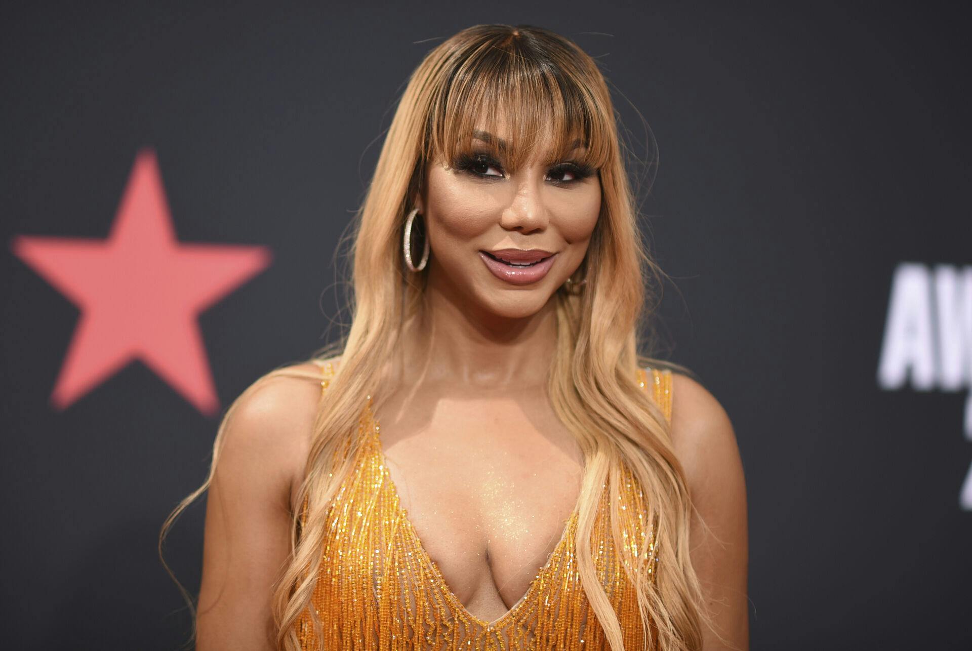 Den amerikanske sanger Tamar Braxton afviser nu, at hun skulle have haft en affære med storesøsterens mand.